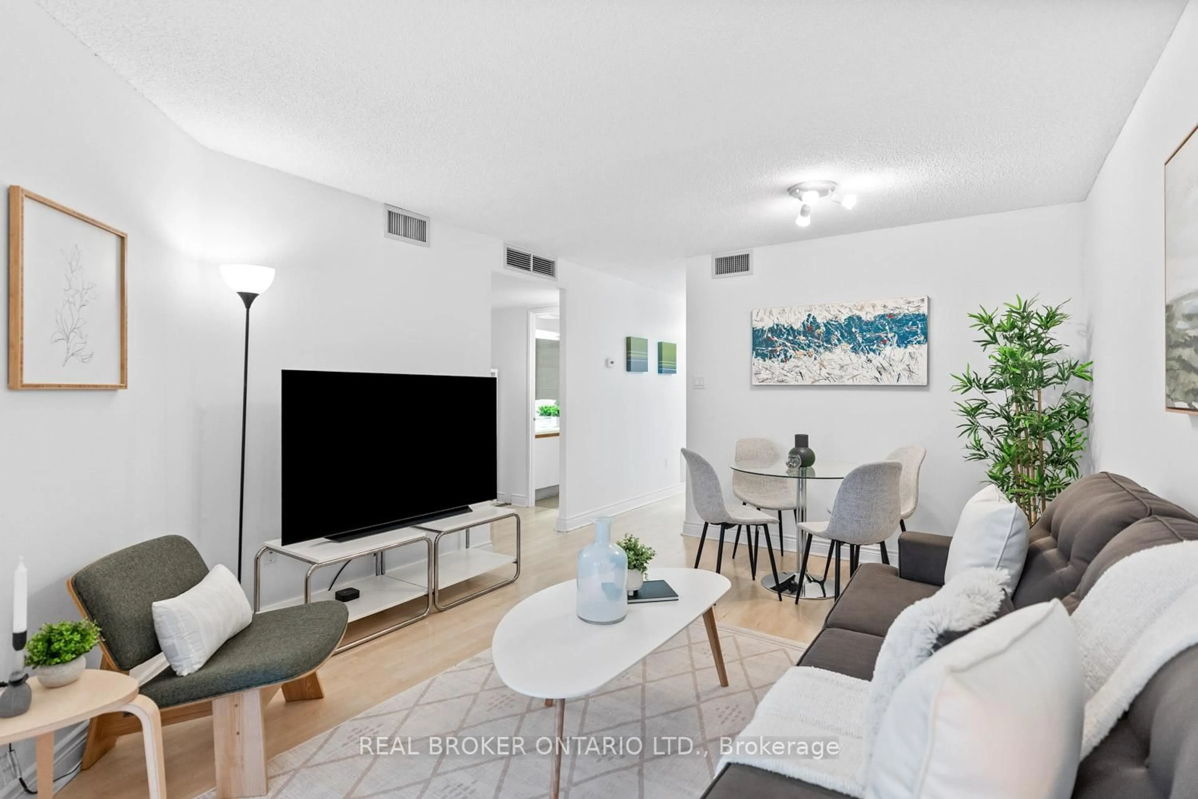 Living room with furniture, unknown for 65 Scadding Ave #223, Toronto Ontario M5A 4L1
