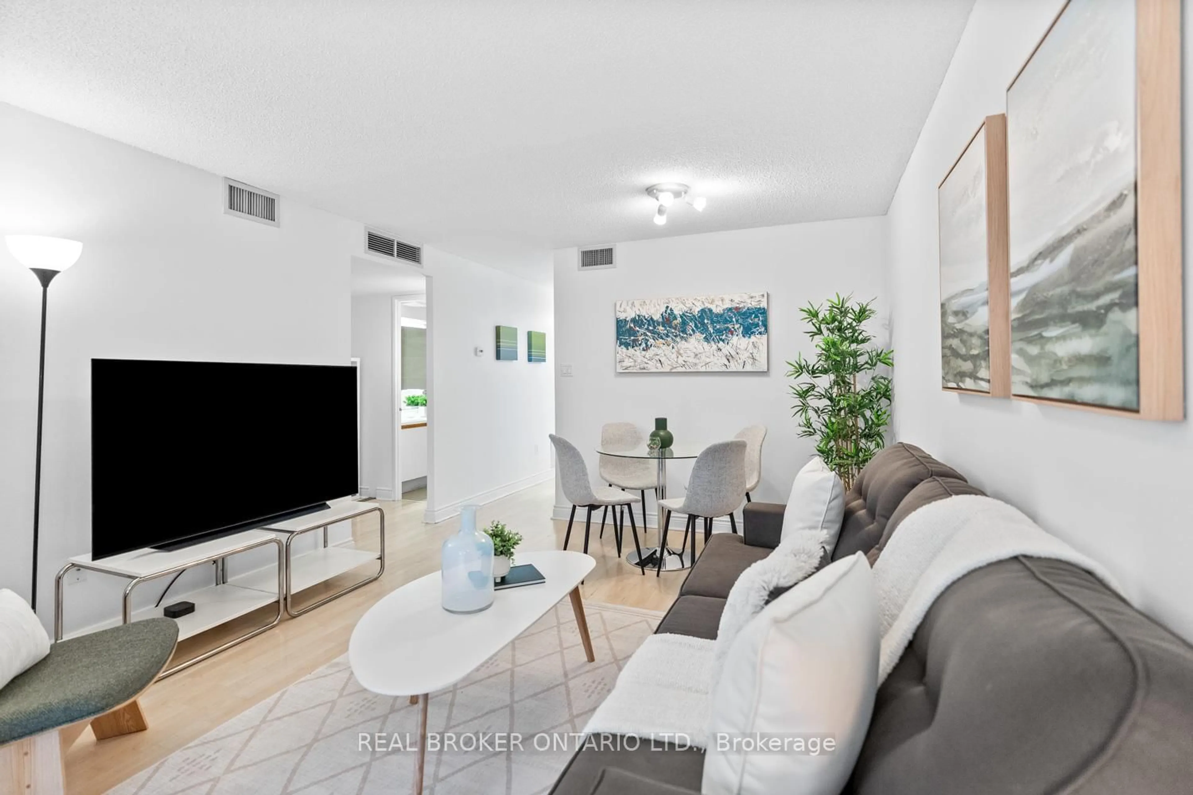 Living room with furniture, unknown for 65 Scadding Ave #223, Toronto Ontario M5A 4L1