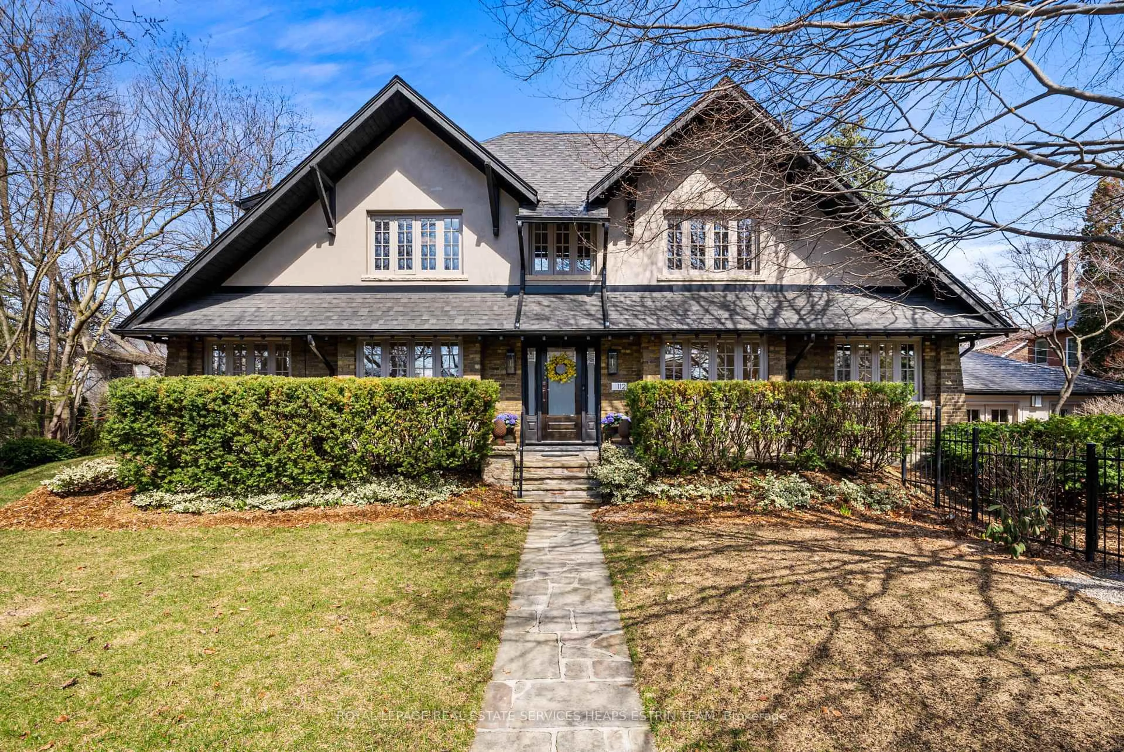 Home with brick exterior material, street for 112 Douglas Dr, Toronto Ontario M4W 2B5