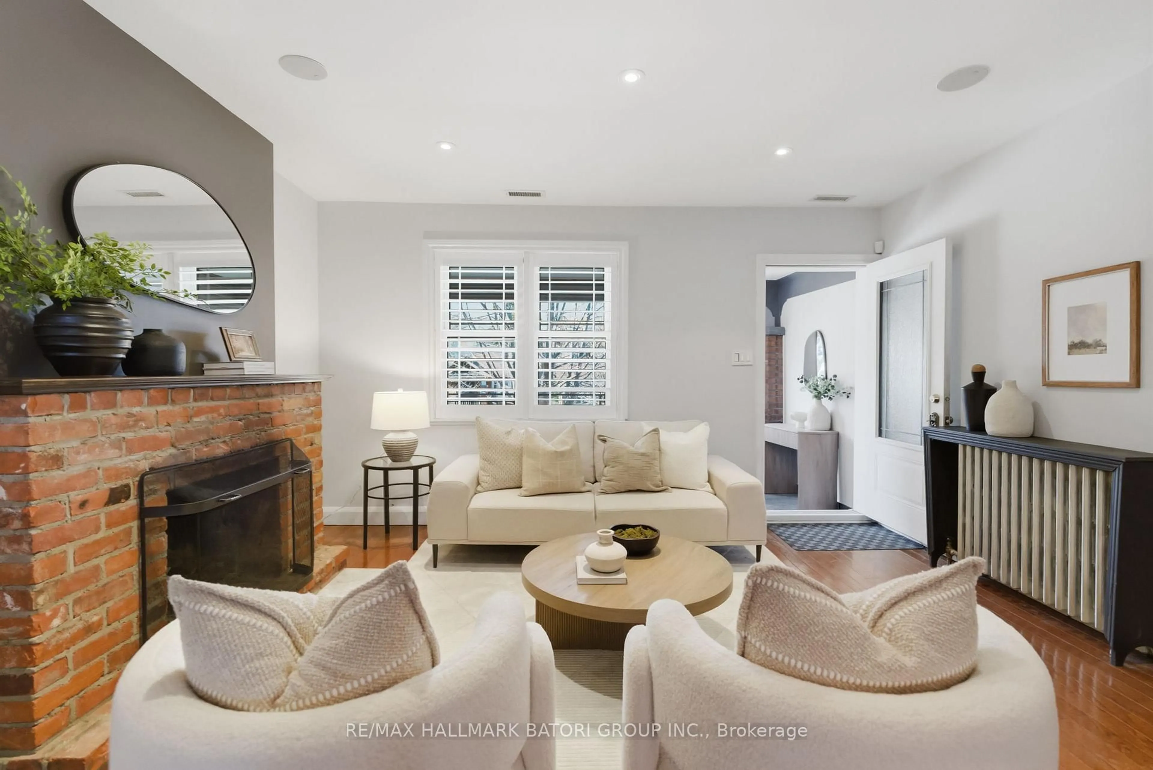 Living room with furniture, ceramic/tile floor for 261 Castlefield Ave, Toronto Ontario M4R 1G6