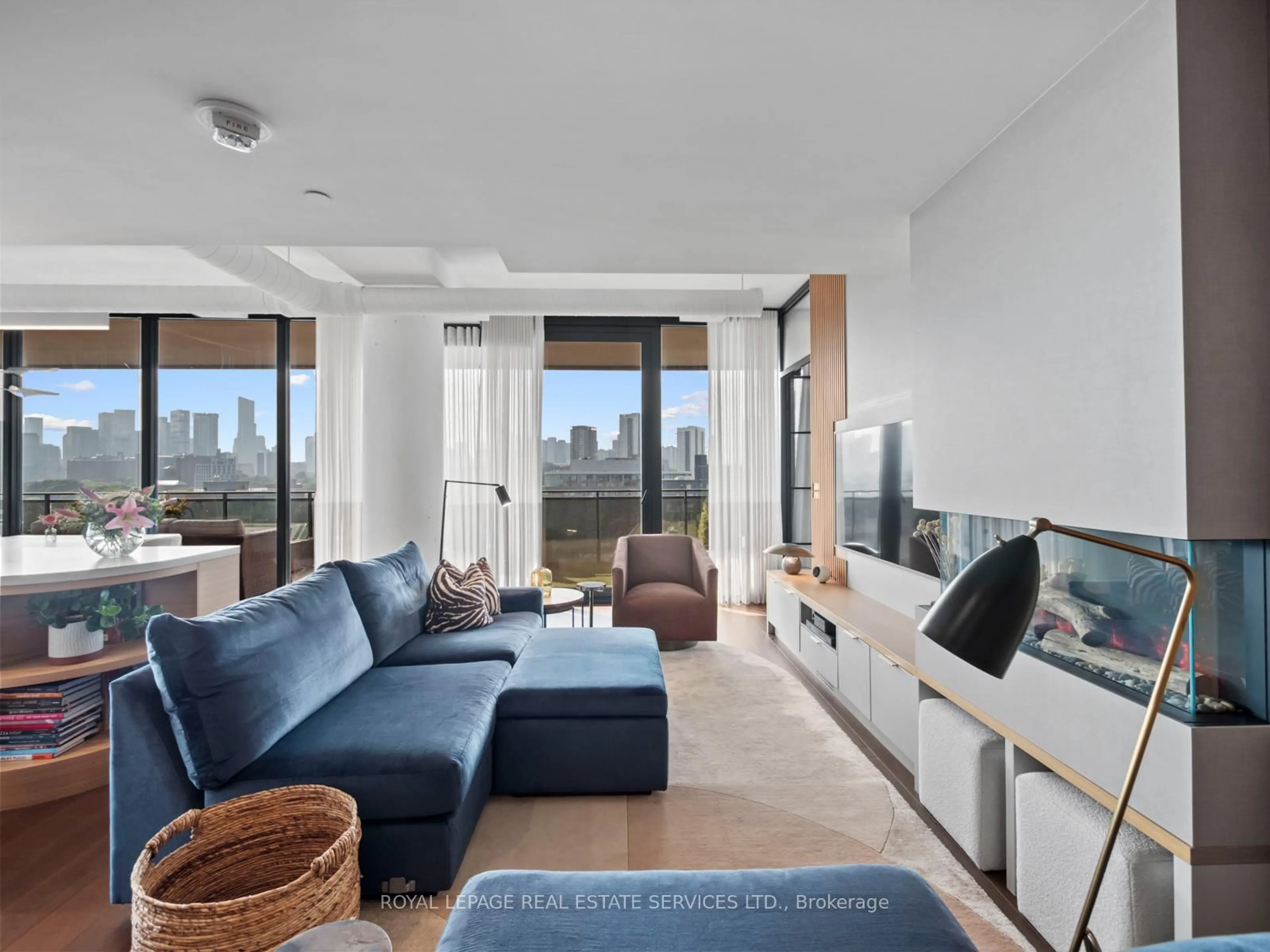 Living room with furniture, unknown for 21 Lawren Harris Sq #904, Toronto Ontario M5A 0T4