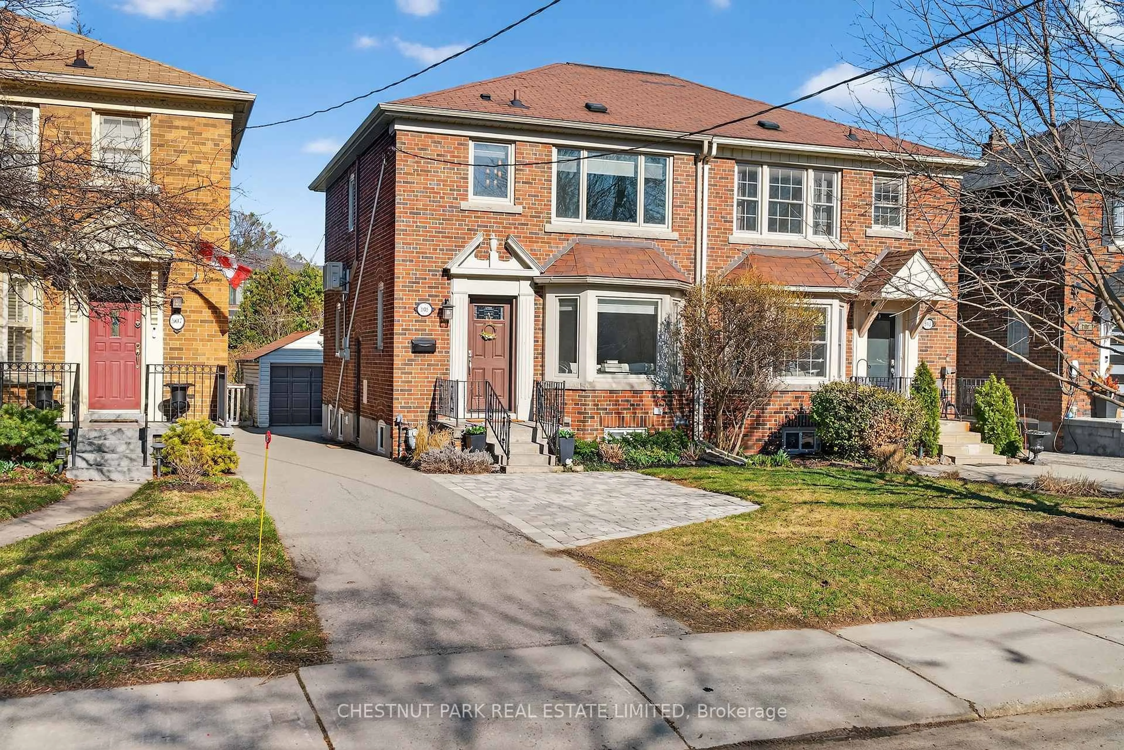 Home with brick exterior material, street for 505 Sutherland Dr, Toronto Ontario M4G 1K9
