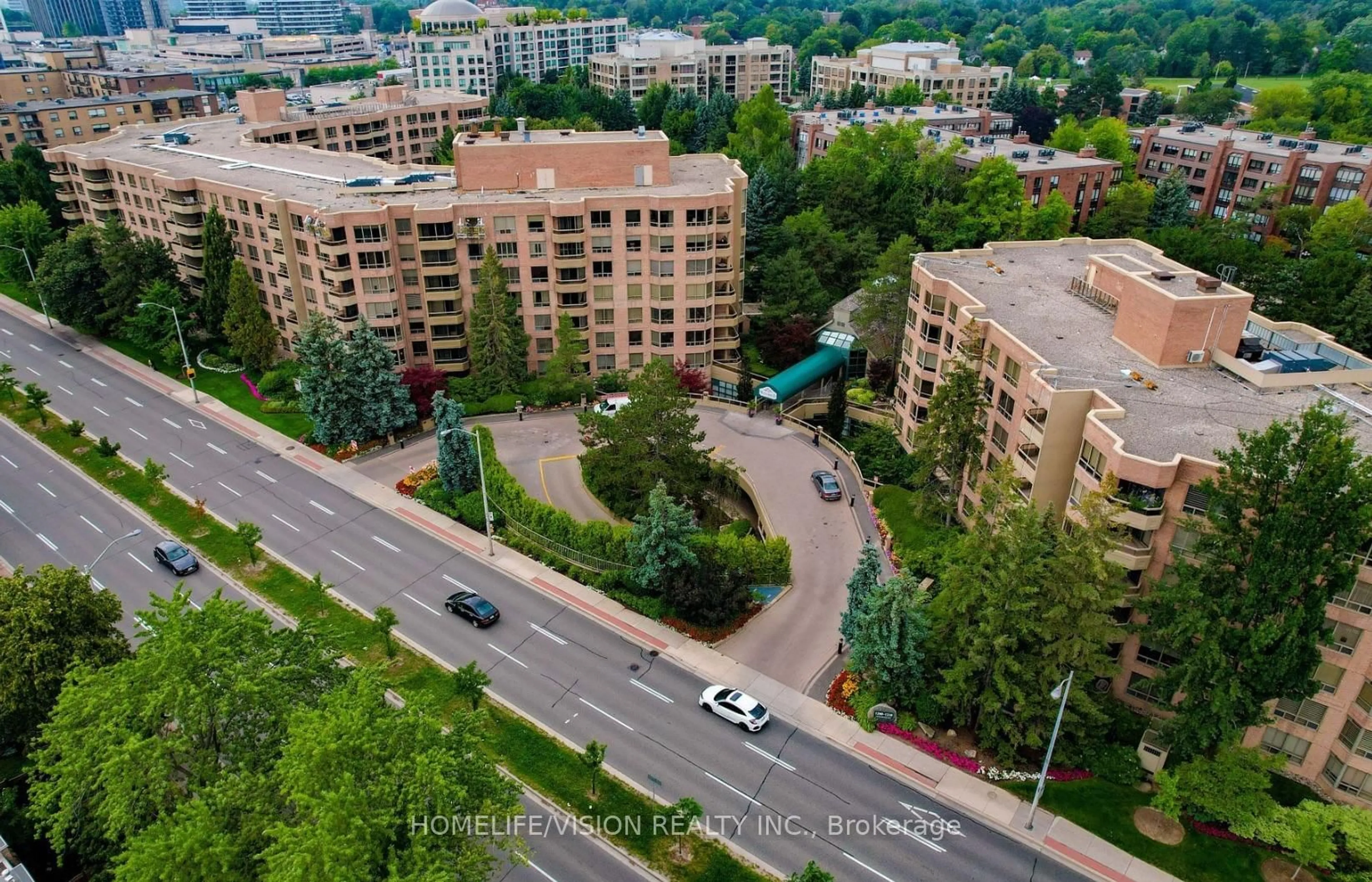A pic from outside/outdoor area/front of a property/back of a property/a pic from drone, city buildings view from balcony for 1200 Don Mills Rd #508, Toronto Ontario M3B 3N8