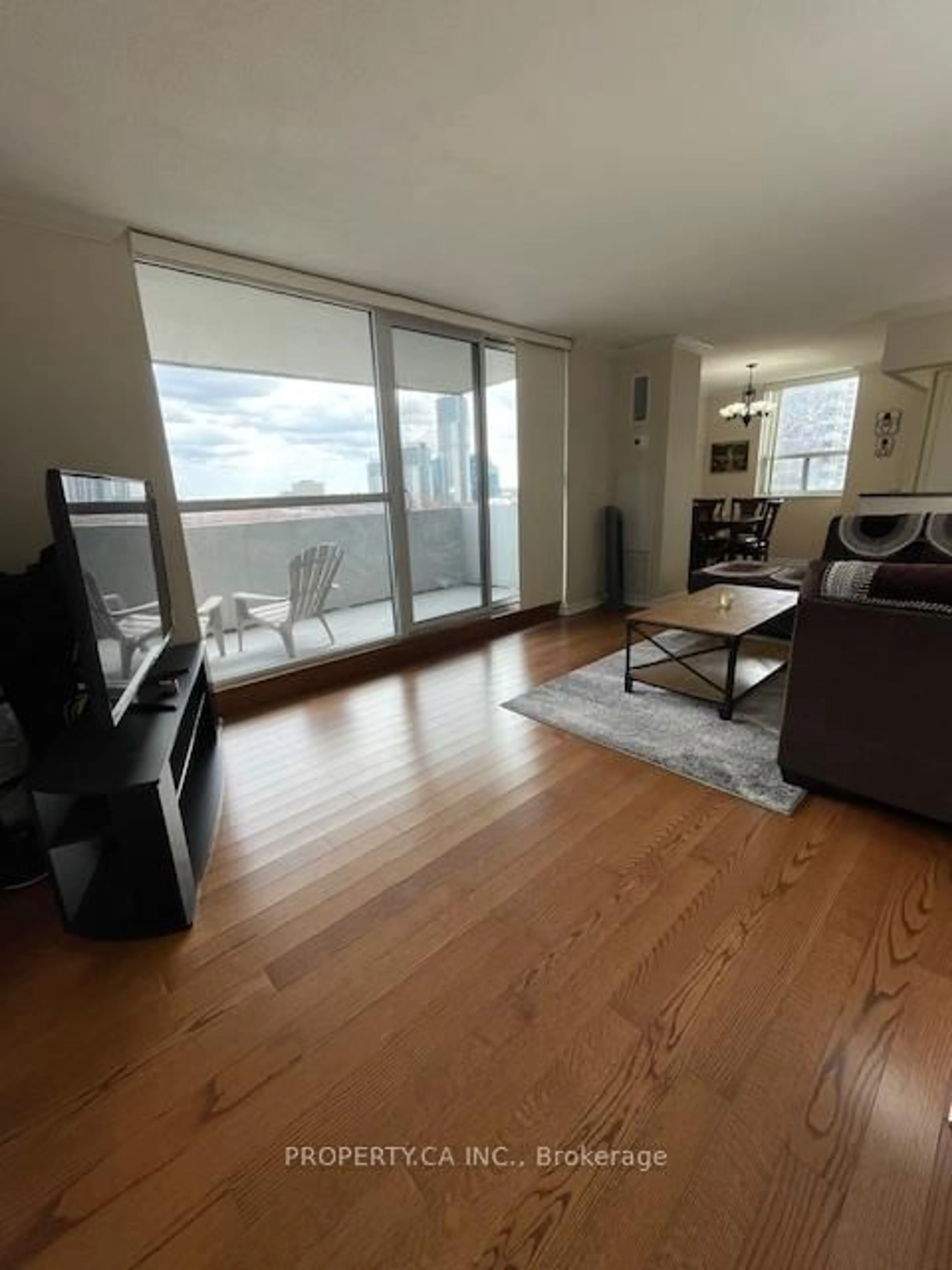 Living room with furniture, wood/laminate floor for 5 Old Sheppard Ave #1003, Toronto Ontario M2J 4K3