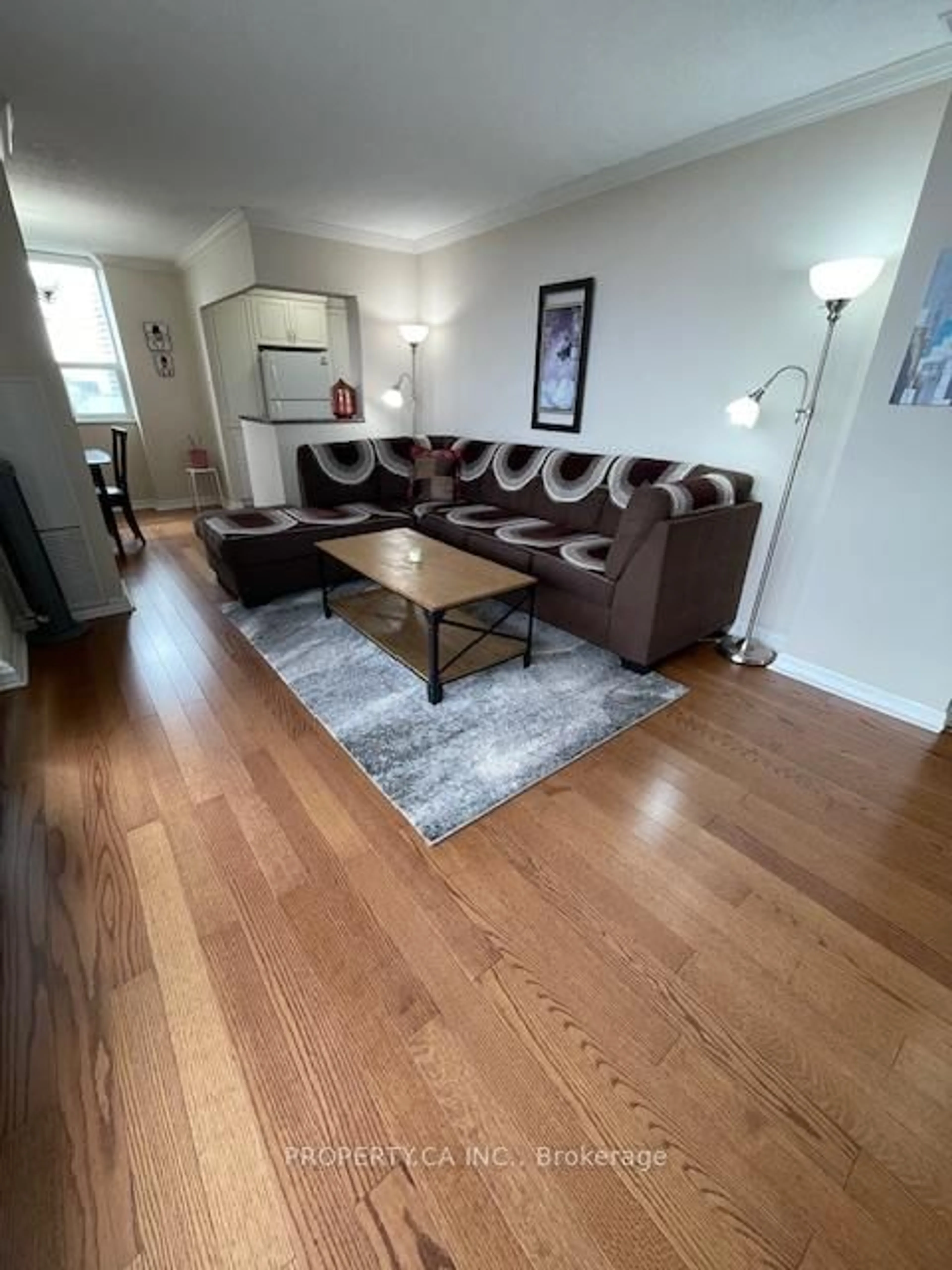 Living room with furniture, wood/laminate floor for 5 Old Sheppard Ave #1003, Toronto Ontario M2J 4K3