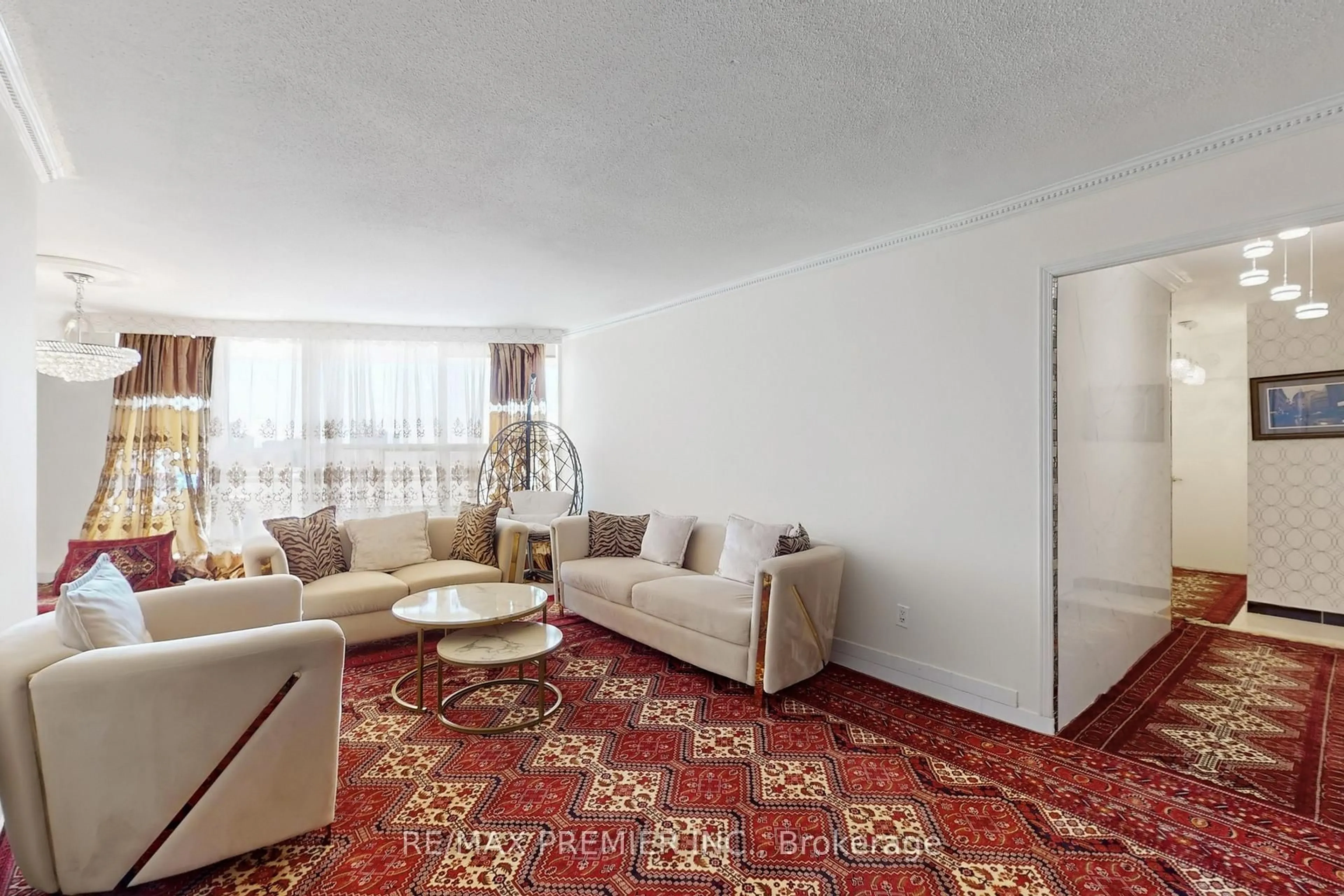 Living room with furniture, carpet floor for 60 Pavane Linkway #1206, Toronto Ontario M3C 1A2