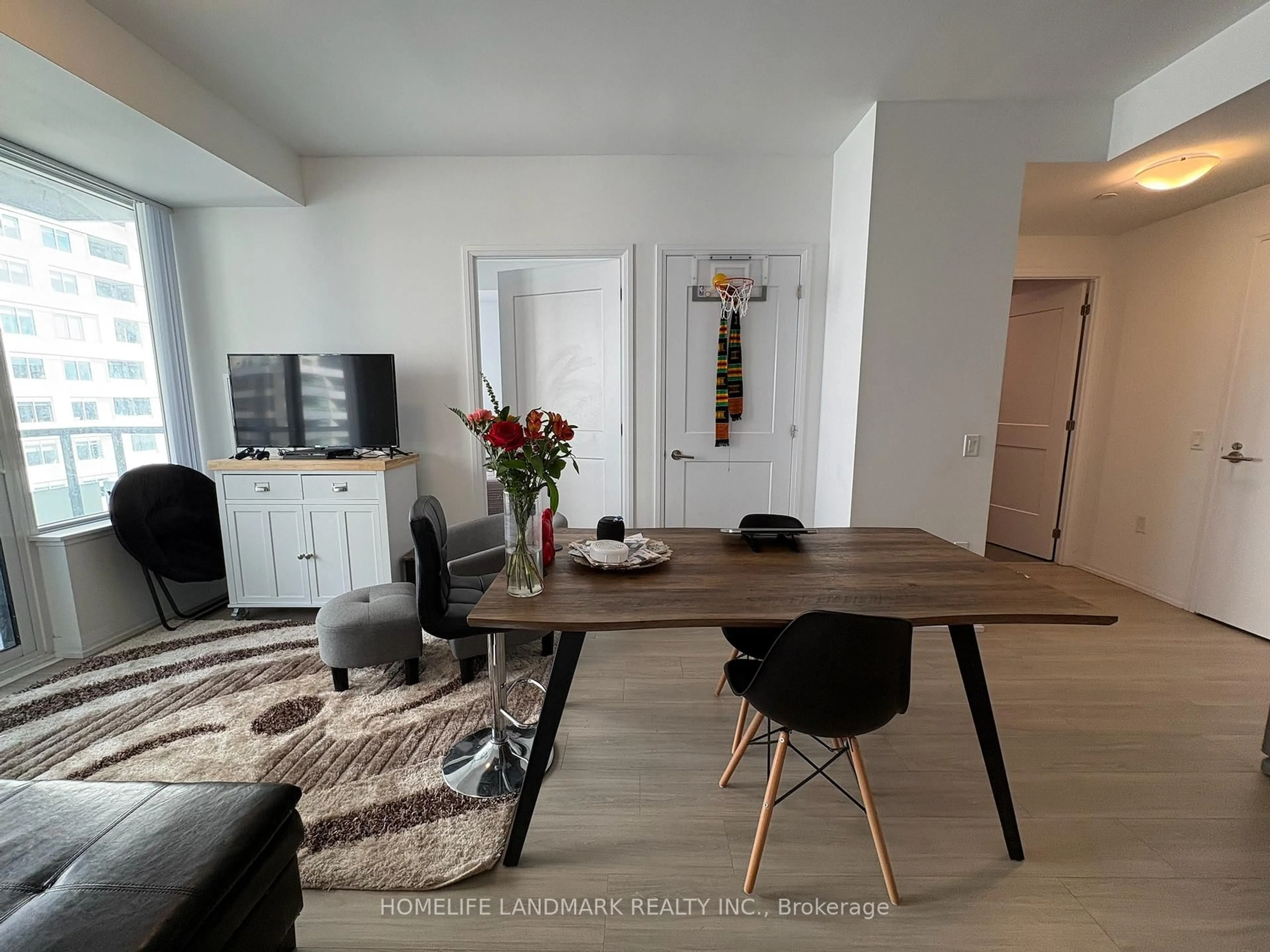 Living room with furniture, wood/laminate floor for 50 Dunfield Ave #1111, Toronto Ontario M4S 0E4