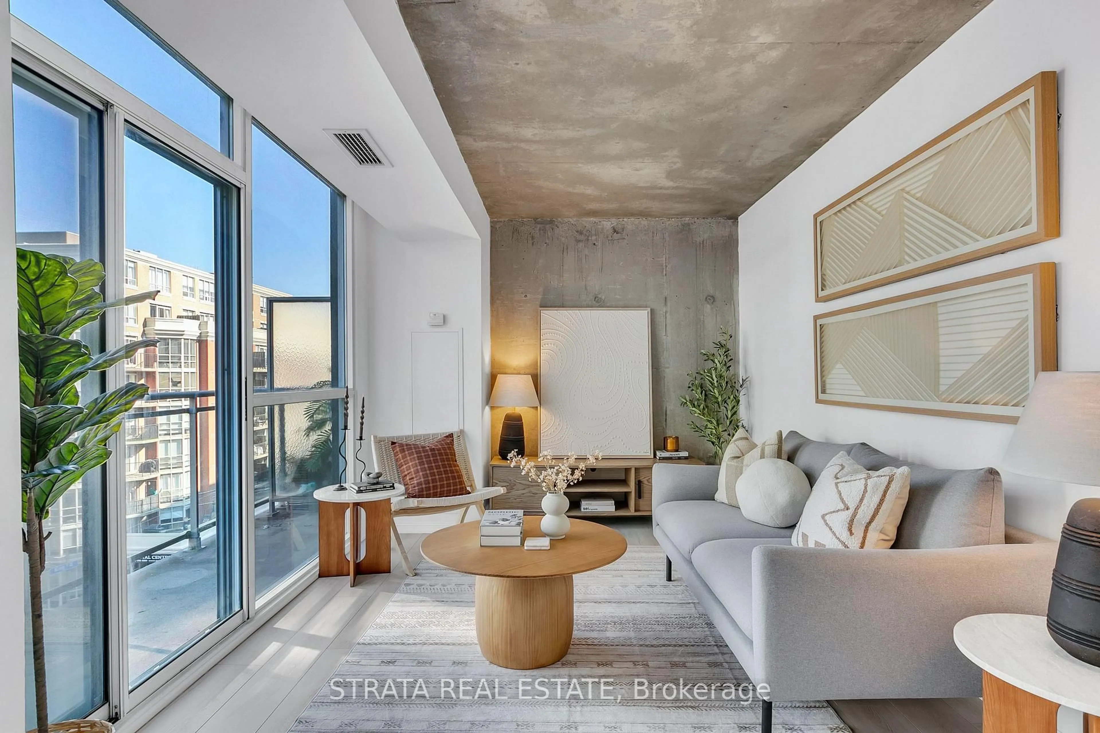 Living room with furniture, cement floor for 1029 King St #629, Toronto Ontario M6K 3M9