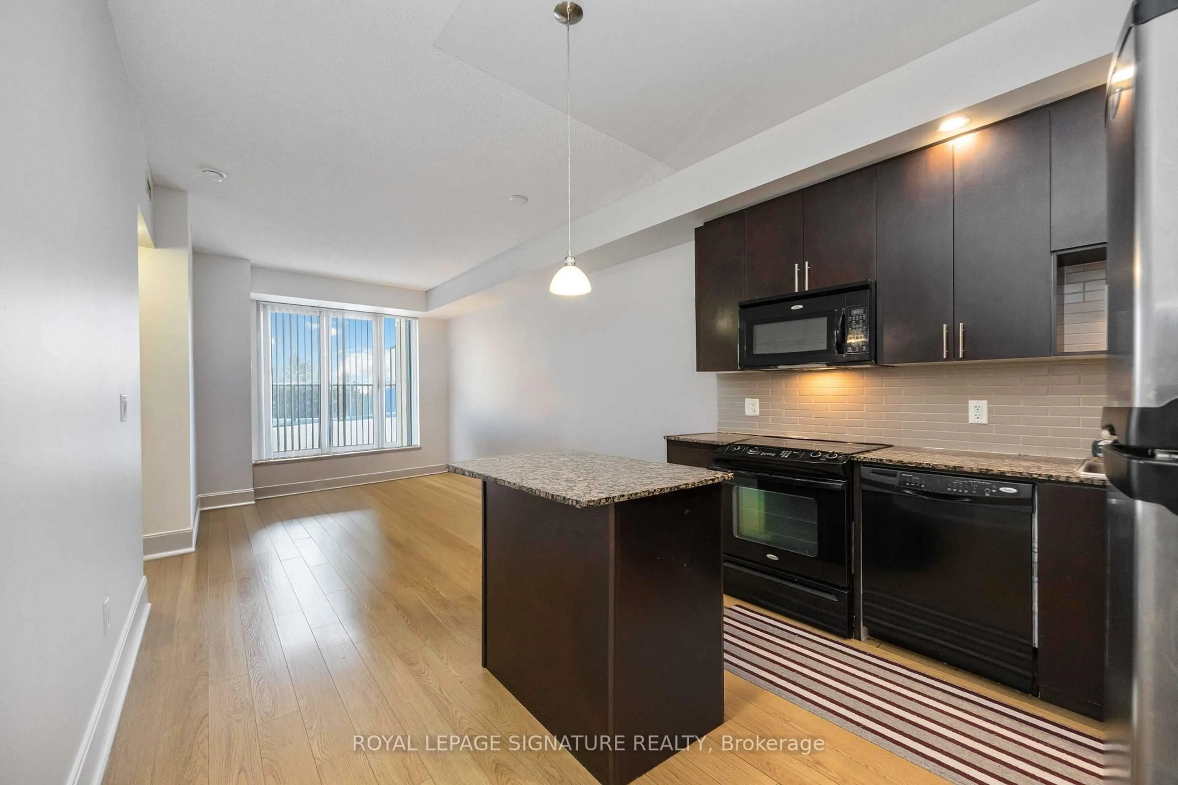 Open concept kitchen, unknown for 181 Wynford Dr #403, Toronto Ontario M3C 0C6
