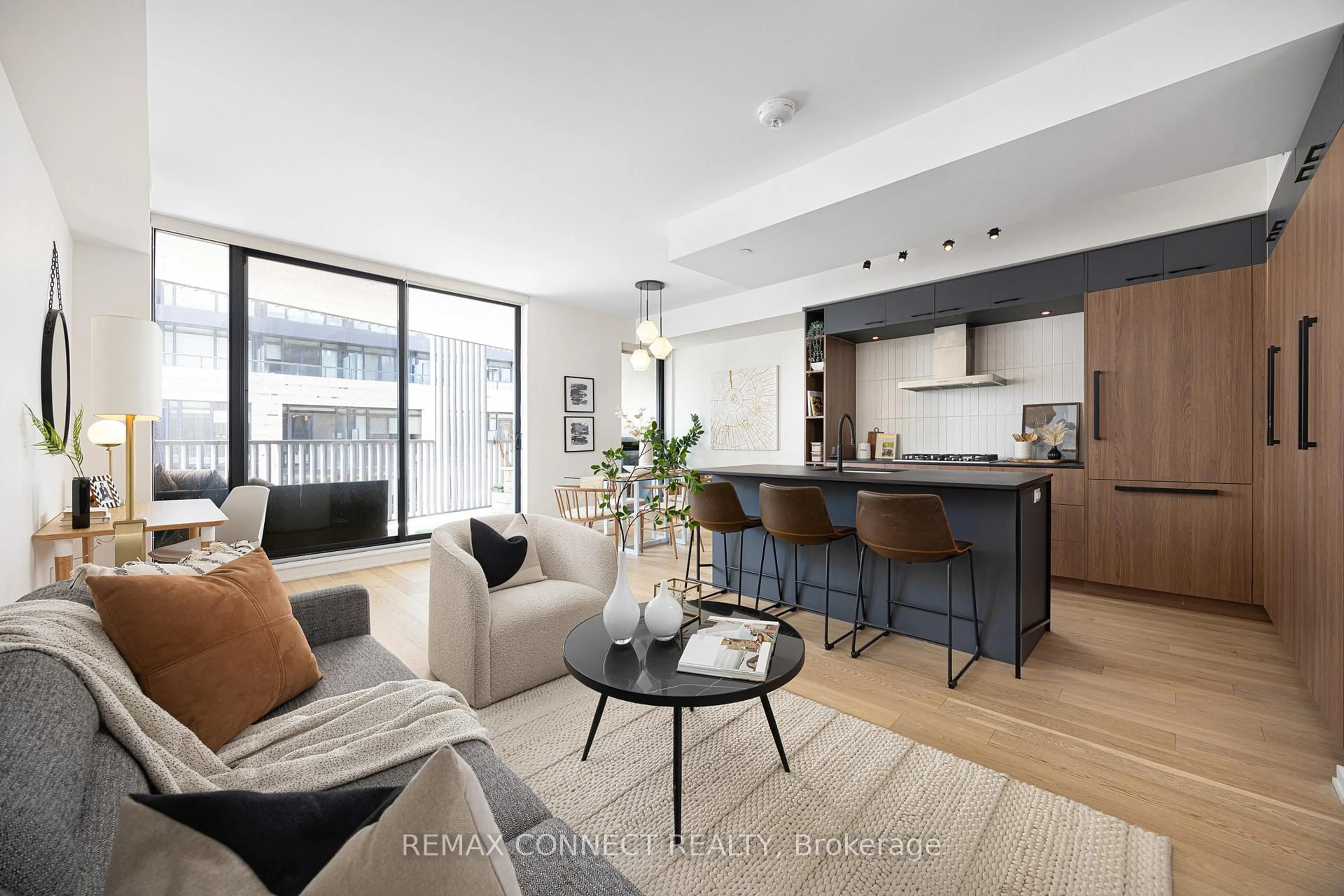 Living room with furniture, unknown for 41 Dovercourt Rd #402, Toronto Ontario M6J 0G6