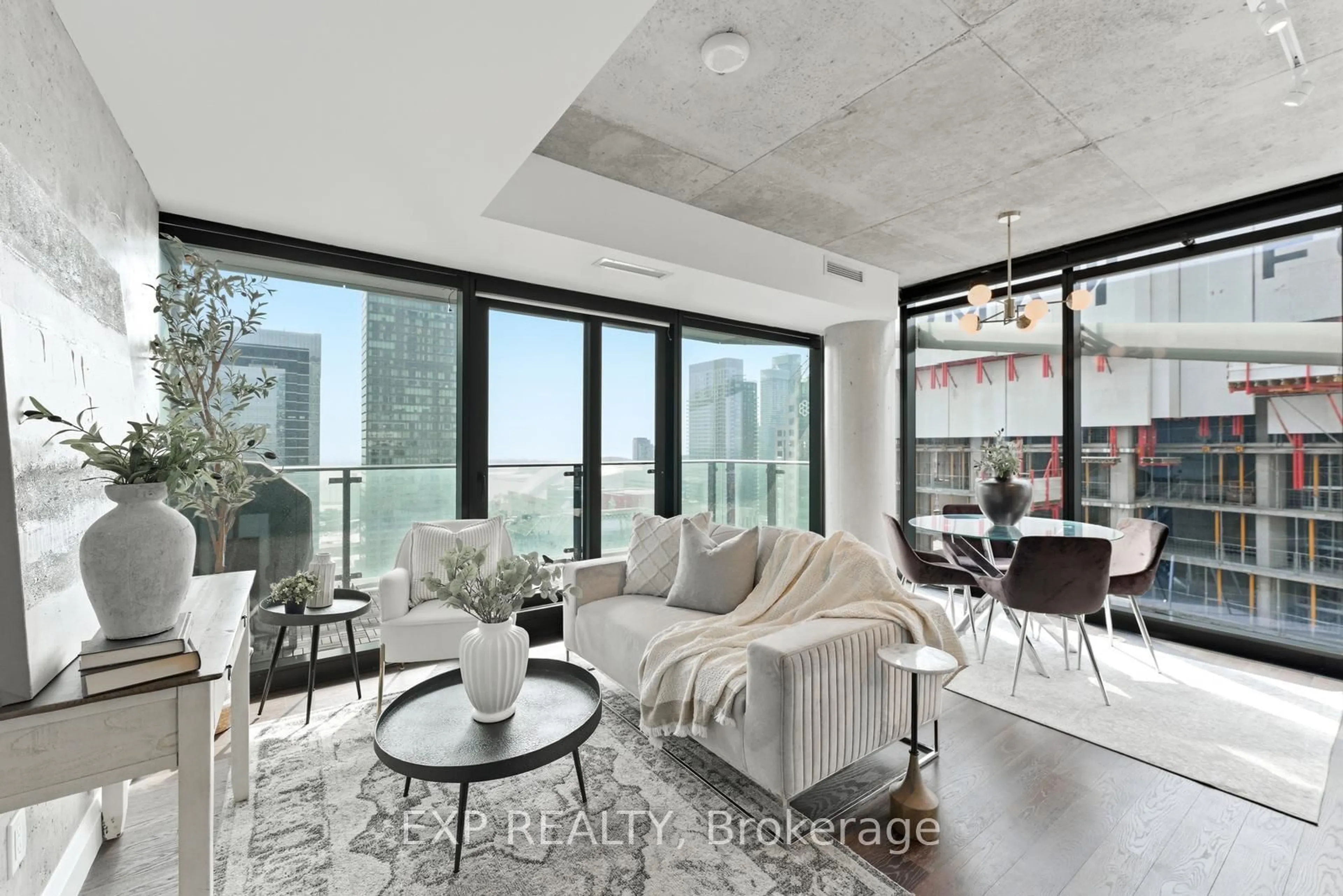 Living room with furniture, cement floor for 224 King St #2906, Toronto Ontario M5H 0A6