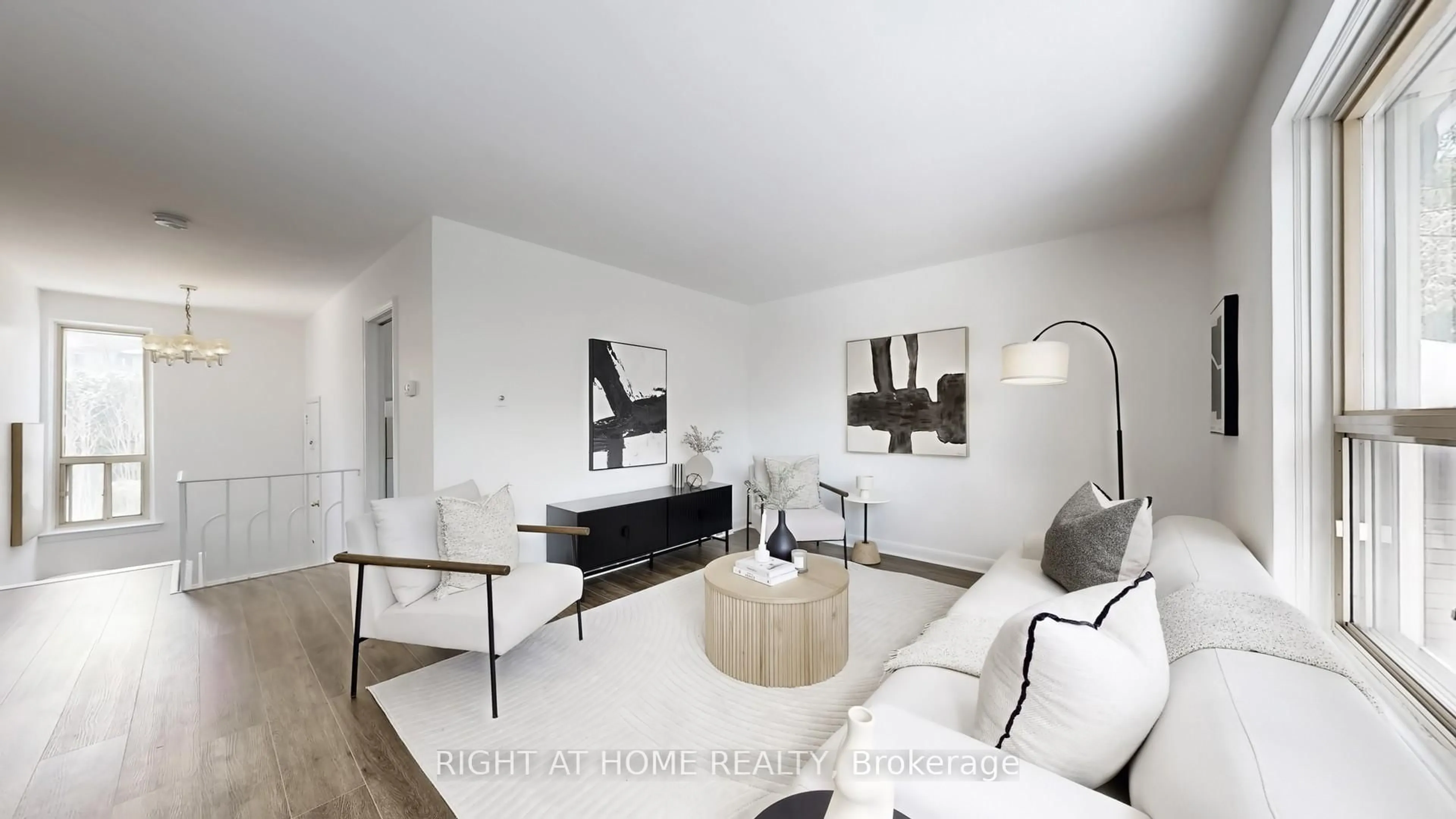 Living room with furniture, unknown for 33 Sanderling Lane, Toronto Ontario M3C 2J2