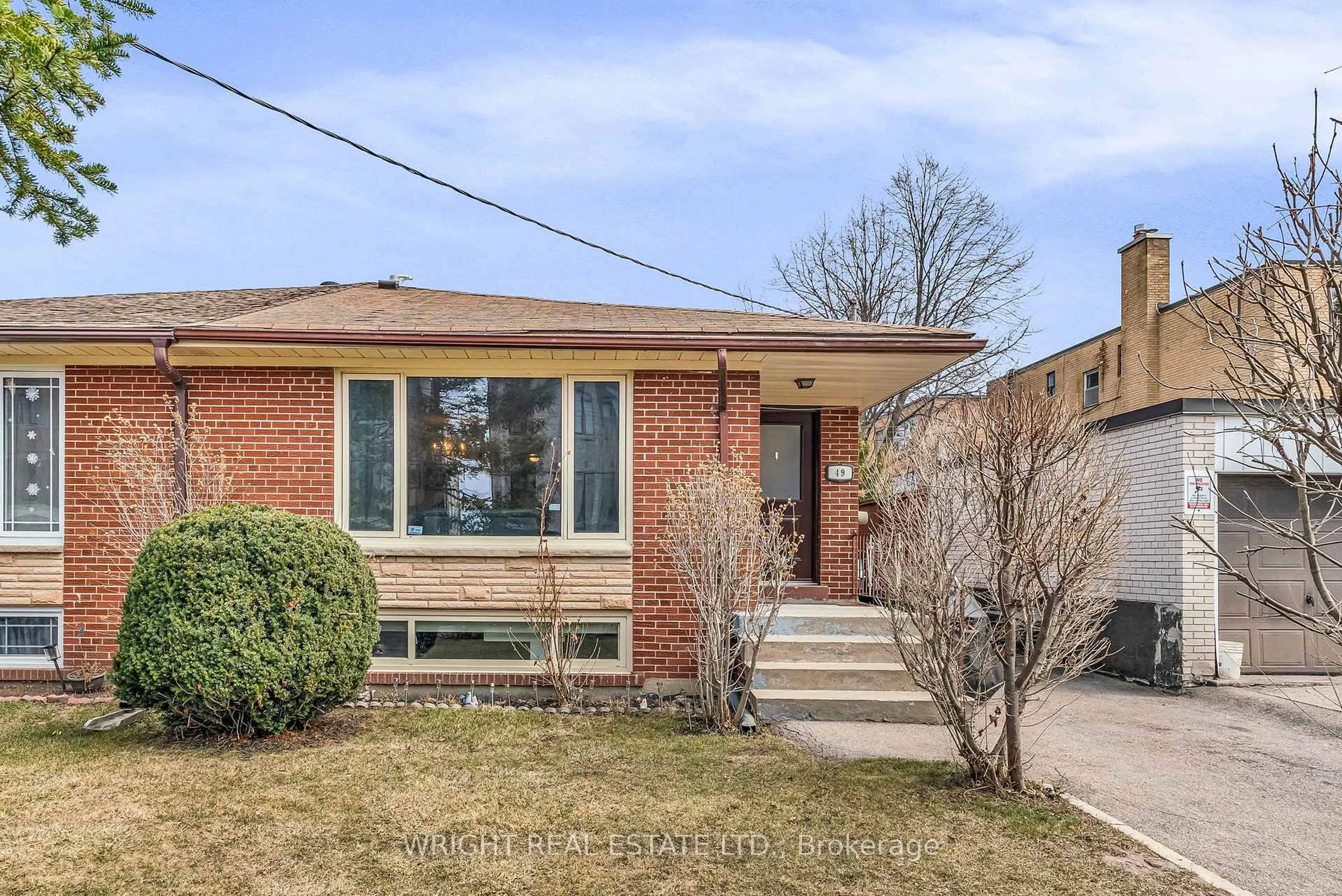 Home with brick exterior material, street for 49 Tisdale Ave, Toronto Ontario M4A 1Y6