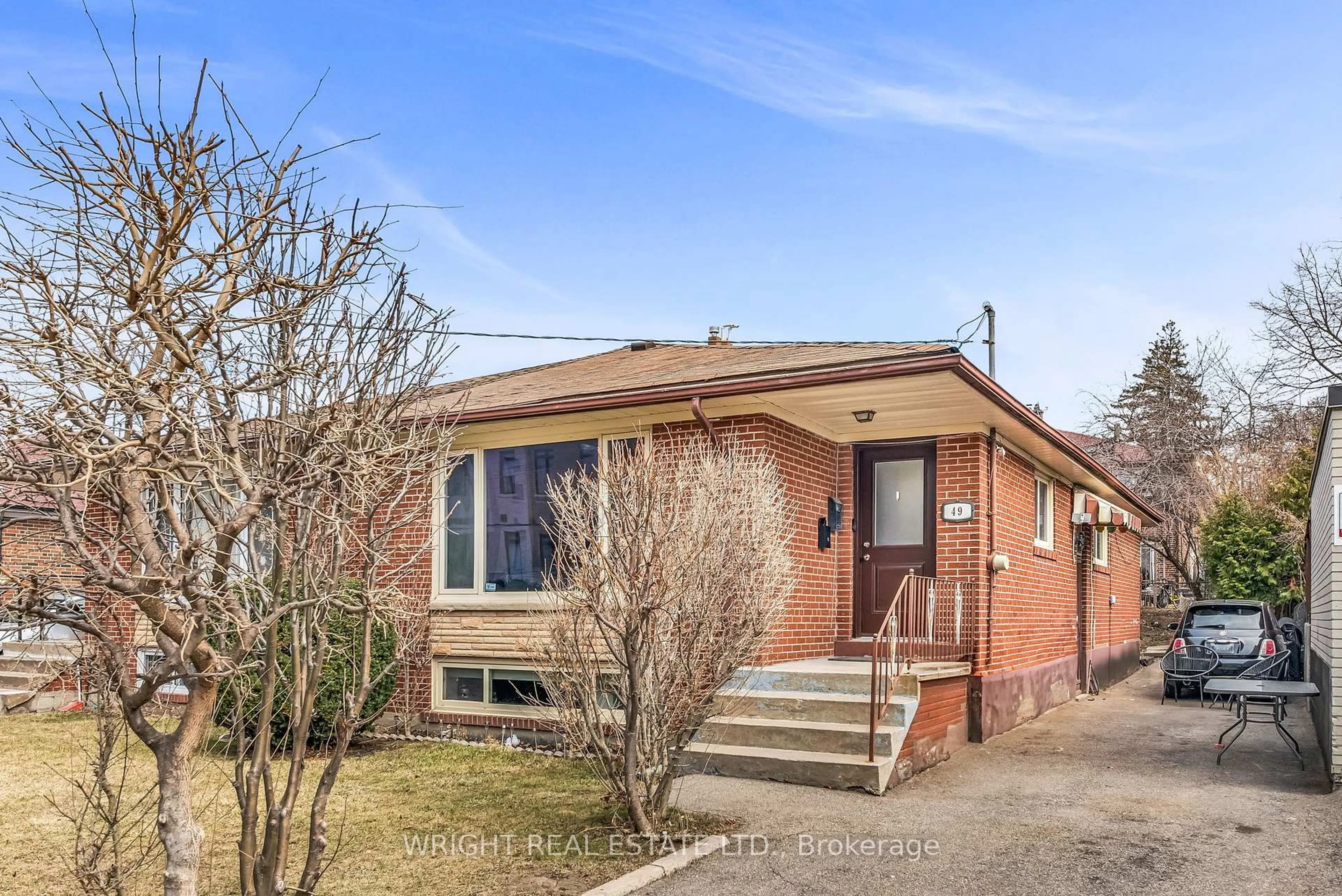 Home with brick exterior material, street for 49 Tisdale Ave, Toronto Ontario M4A 1Y6