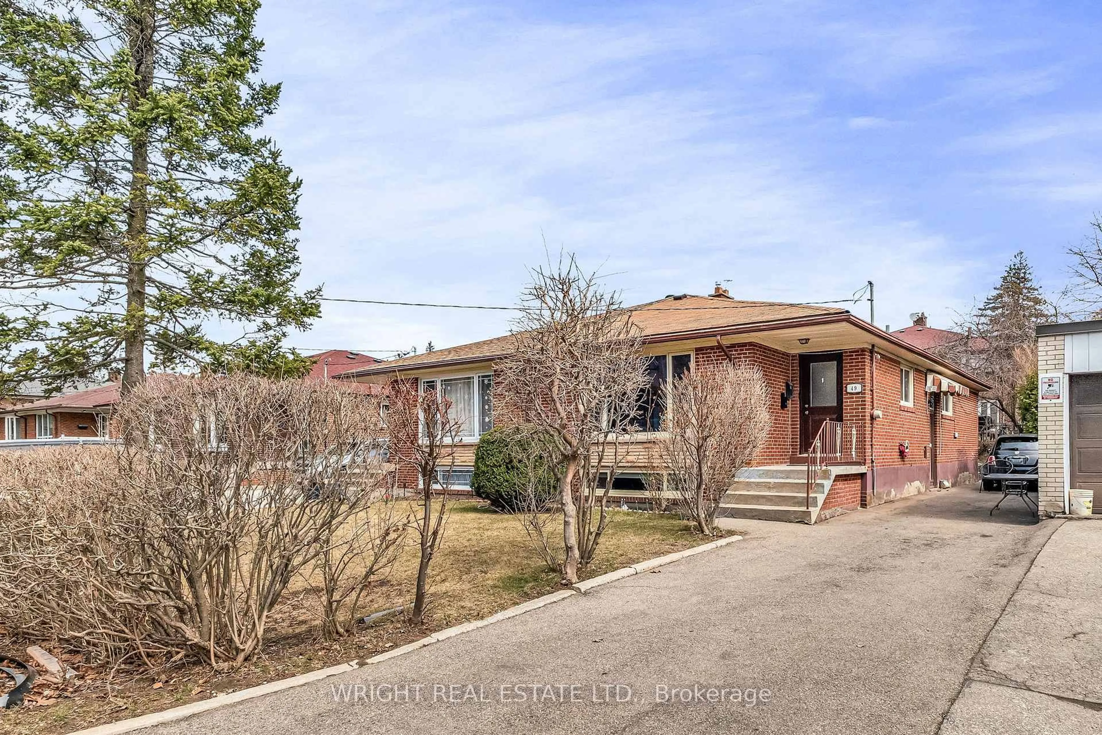 Home with brick exterior material, street for 49 Tisdale Ave, Toronto Ontario M4A 1Y6
