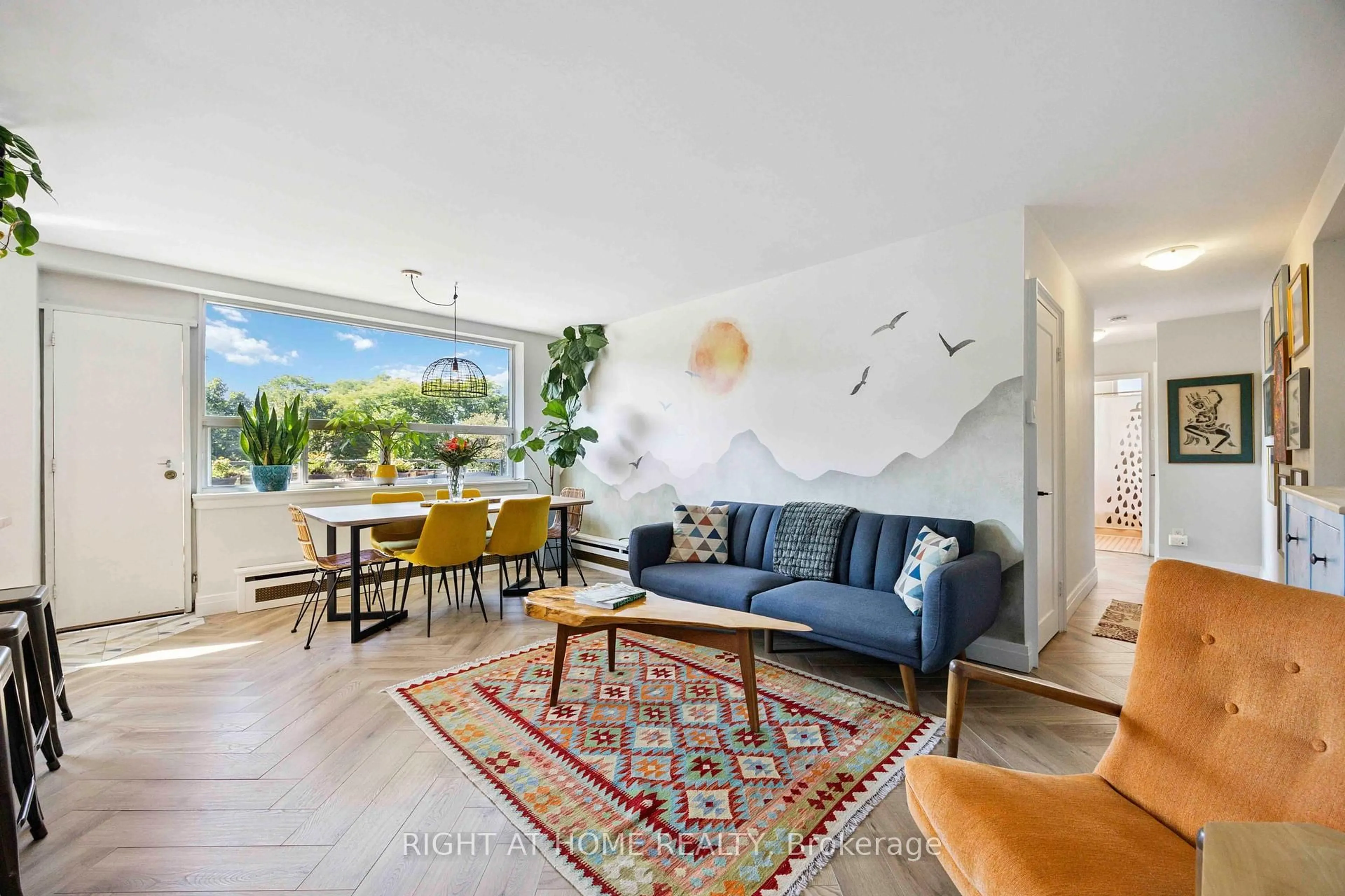 Living room with furniture, unknown for 57 Neptune Dr #103, Toronto Ontario M6A 1X2