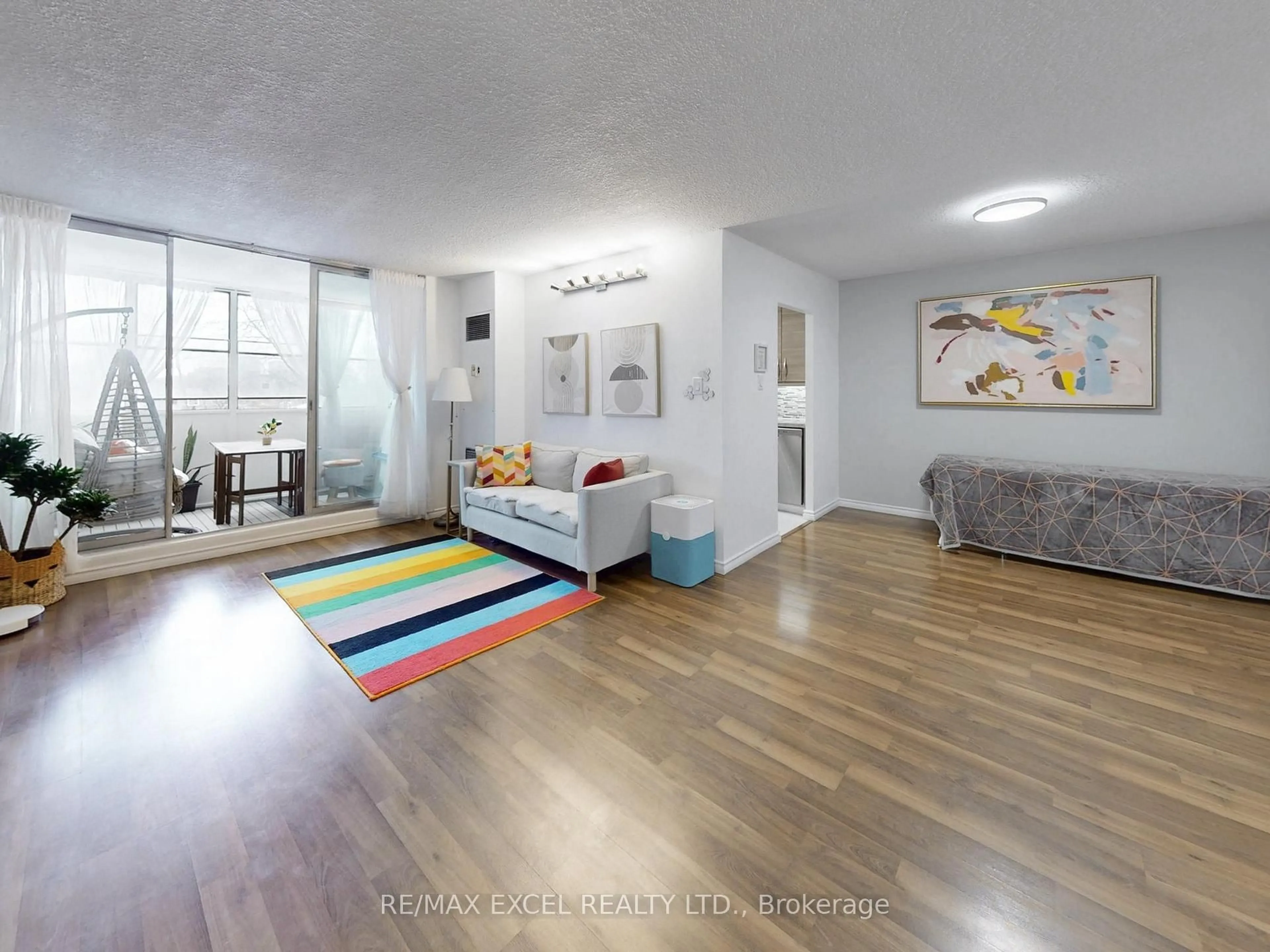 Living room with furniture, unknown for 205 Hilda Ave #301, Toronto Ontario M2M 4B1