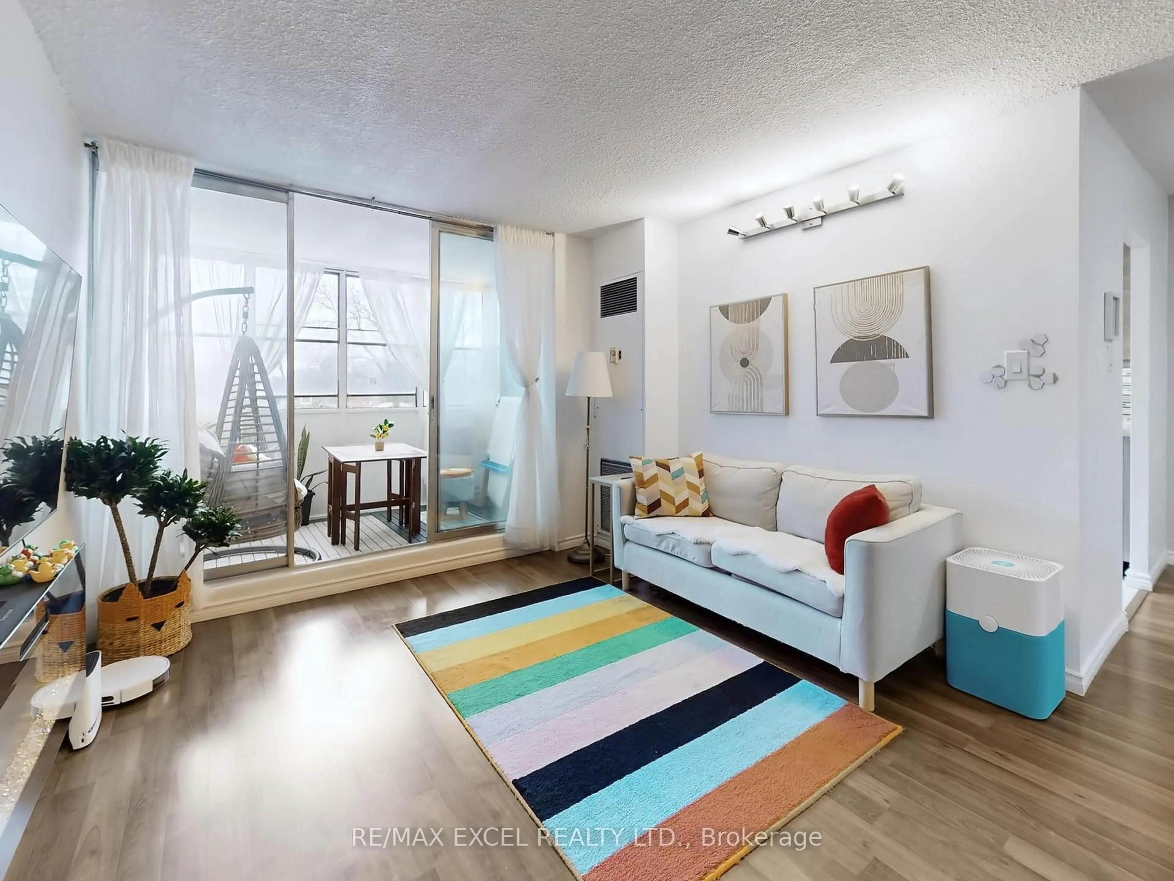 Living room with furniture, unknown for 205 Hilda Ave #301, Toronto Ontario M2M 4B1