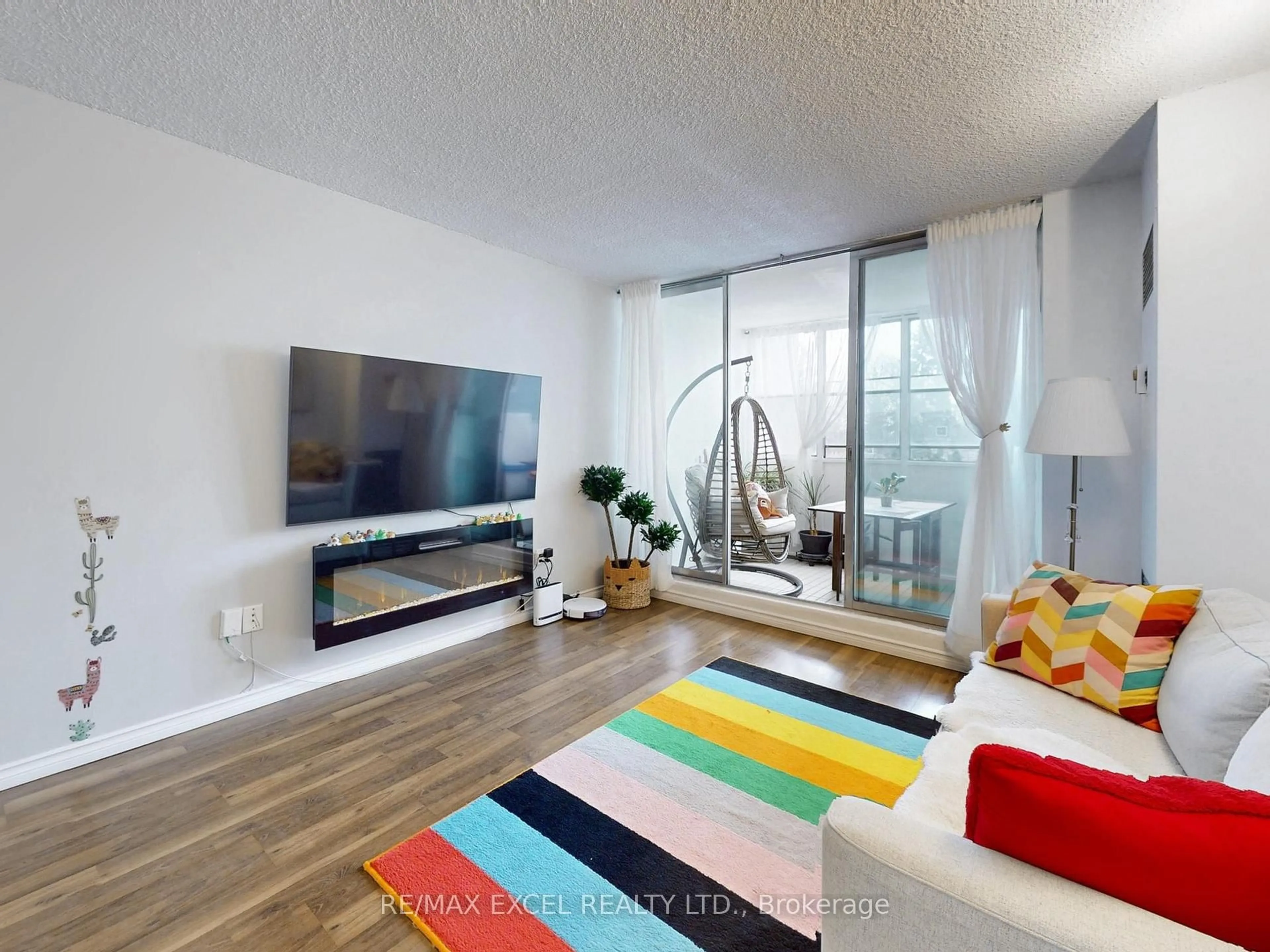 Living room with furniture, unknown for 205 Hilda Ave #301, Toronto Ontario M2M 4B1