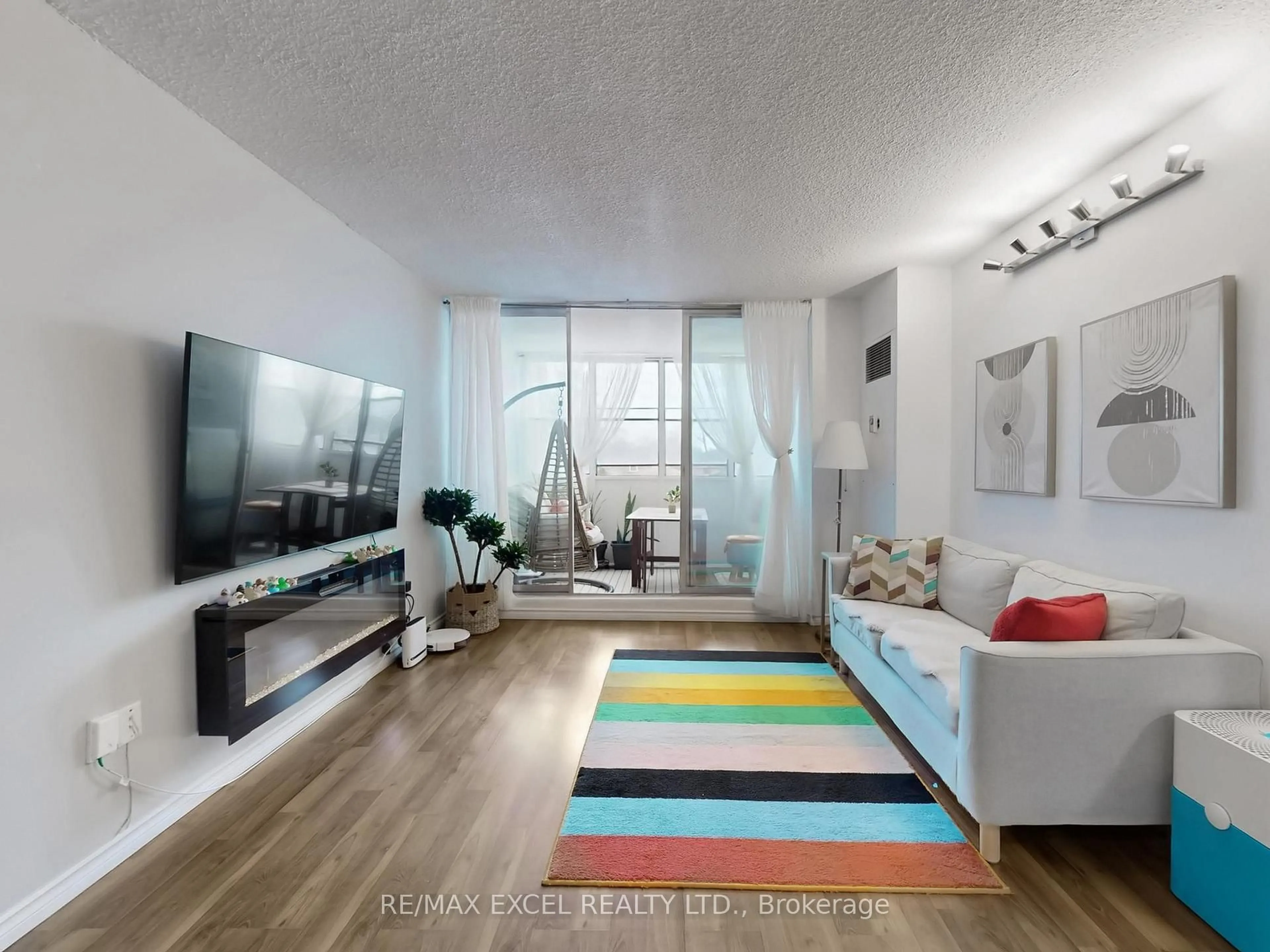 Living room with furniture, unknown for 205 Hilda Ave #301, Toronto Ontario M2M 4B1