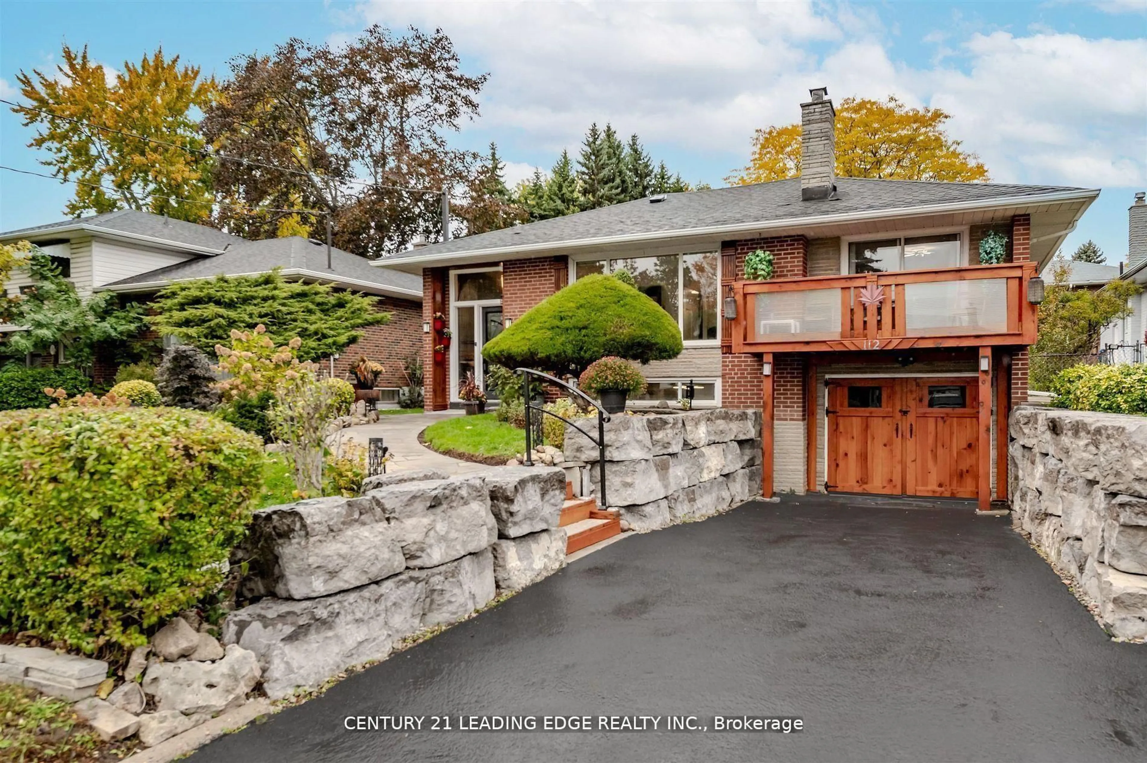 Home with brick exterior material, street for 112 Wyndcliff Cres, Toronto Ontario M4A 2K3