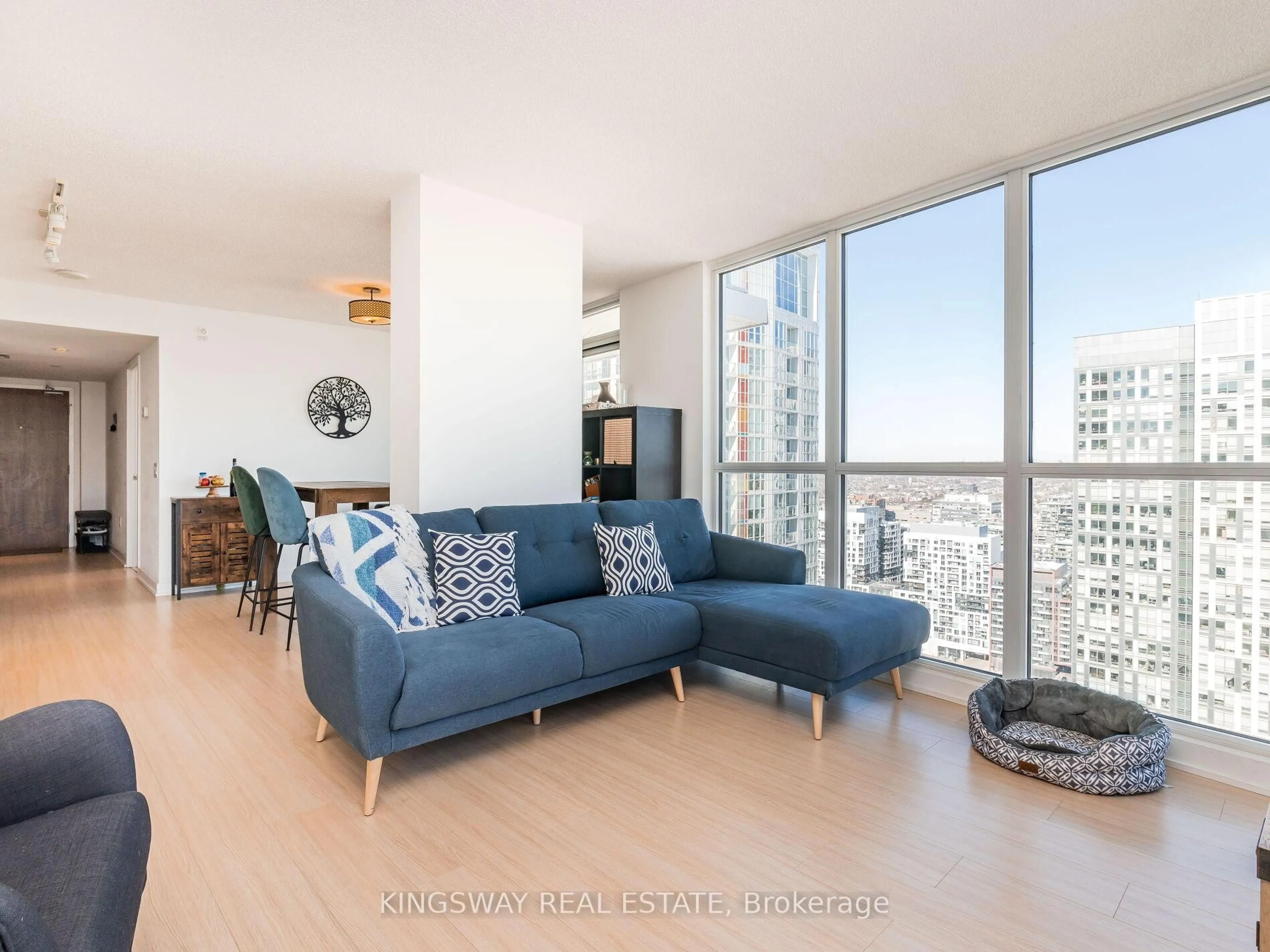 Living room with furniture, wood/laminate floor for 75 Queens Wharf Rd #4001, Toronto Ontario M5V 0J8
