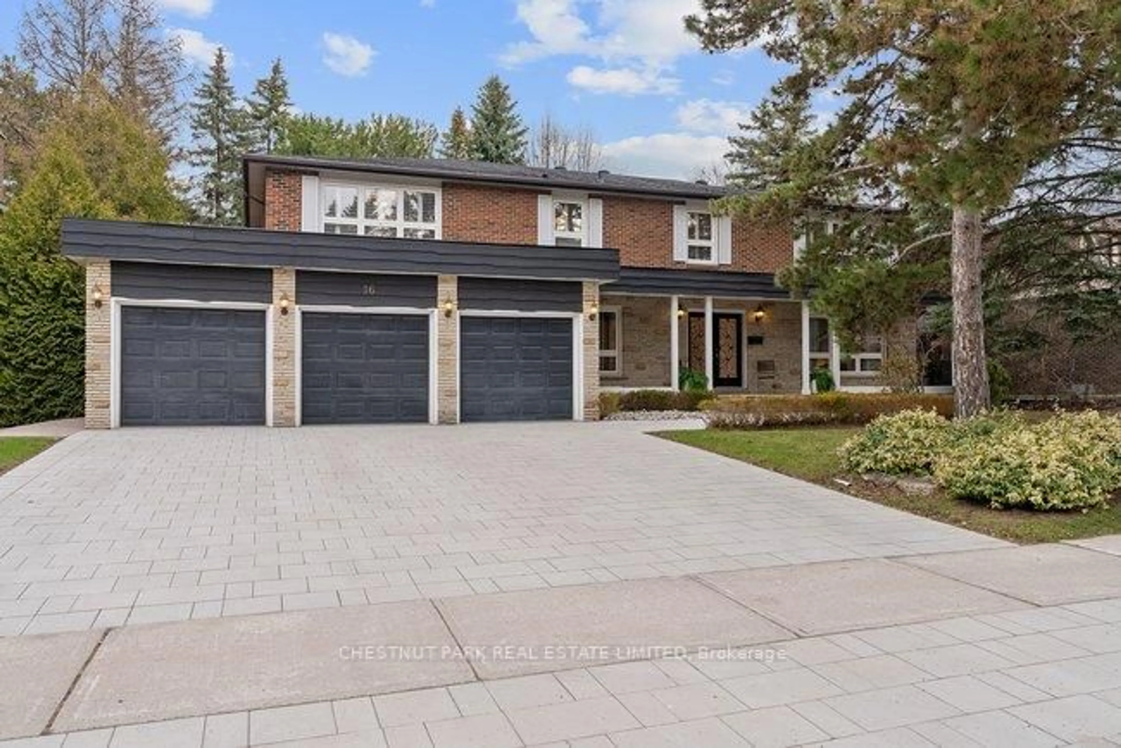 Home with brick exterior material, street for 16 Sagewood Dr, Toronto Ontario M3B 3G5