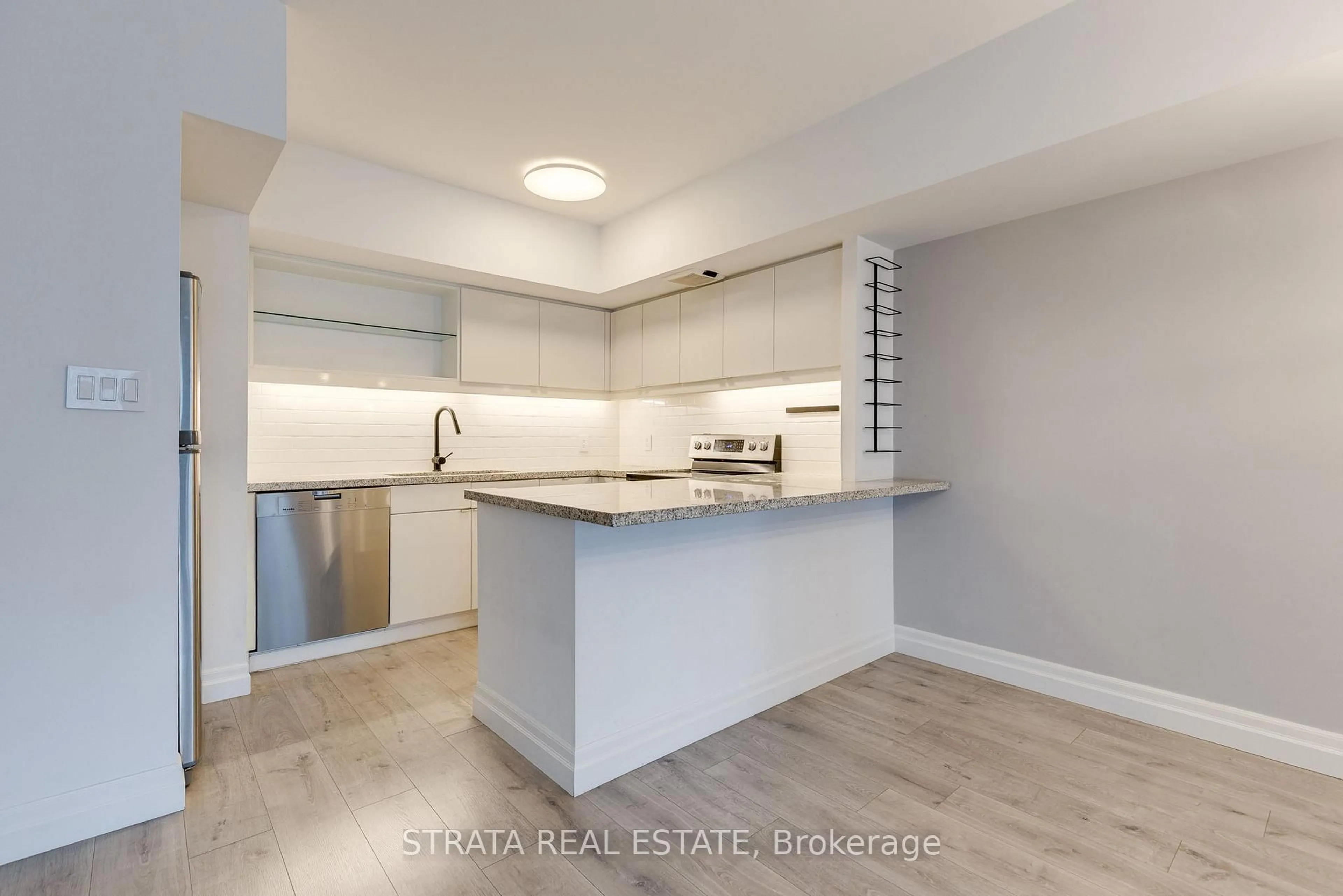 Open concept kitchen, unknown for 25 The Esplanade #1701, Toronto Ontario M5E 1W5