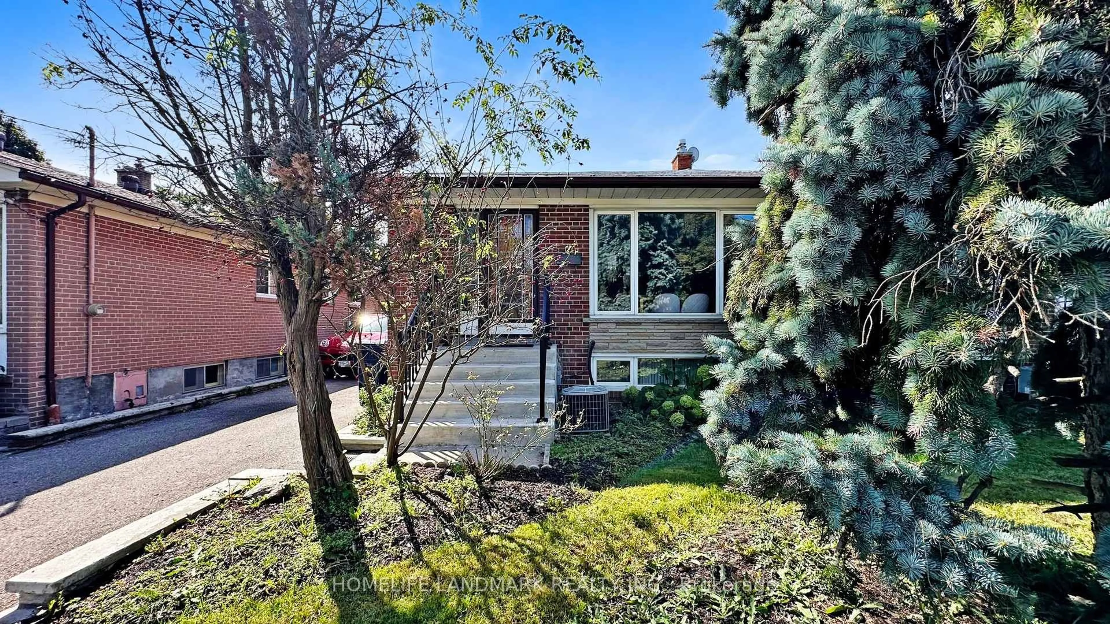 Home with brick exterior material, street for 26 Roywood Dr, Toronto Ontario M3A 2C6