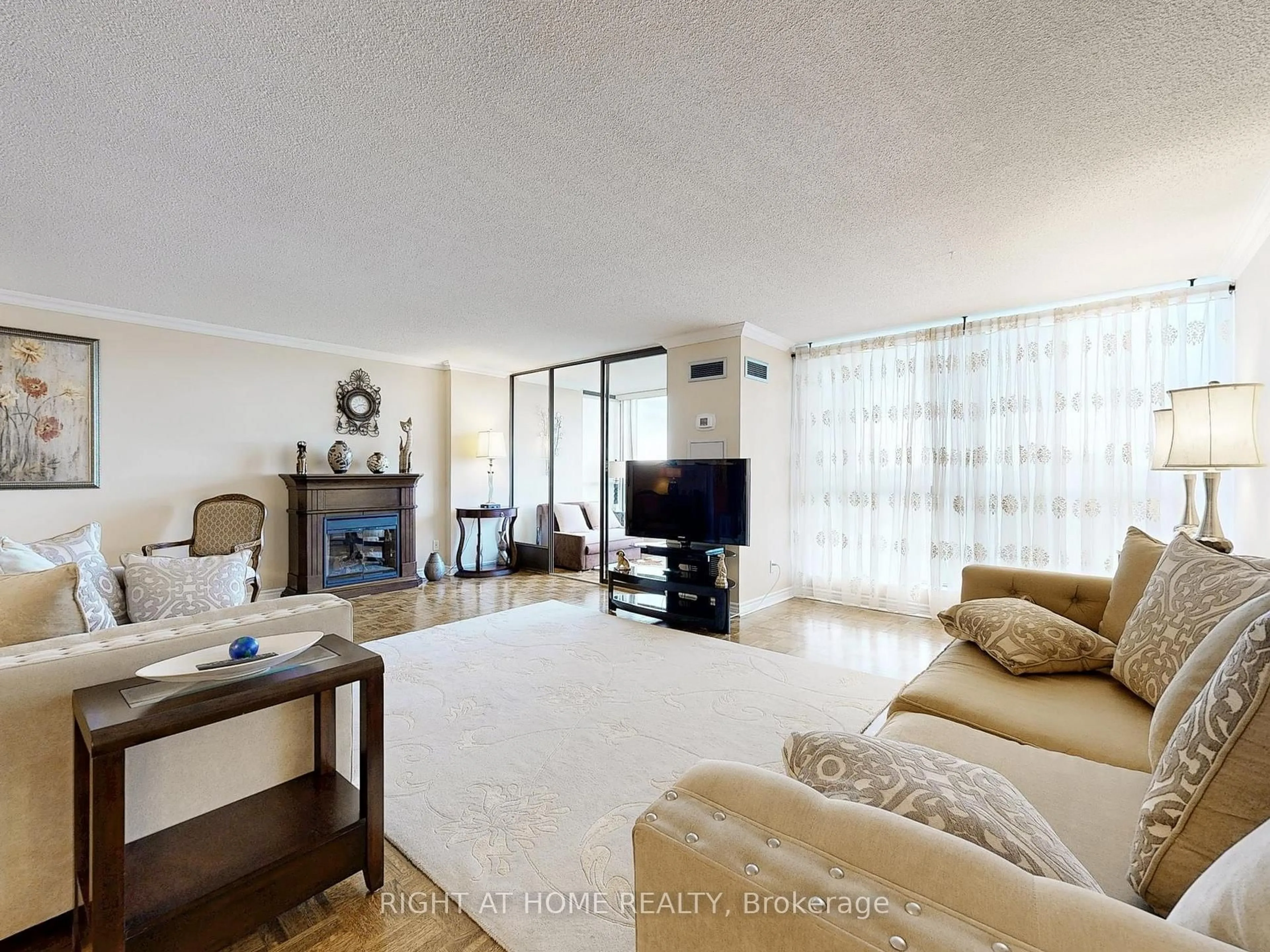 Living room with furniture, unknown for 131 Torresdale Ave #908, Toronto Ontario M2R 3T1