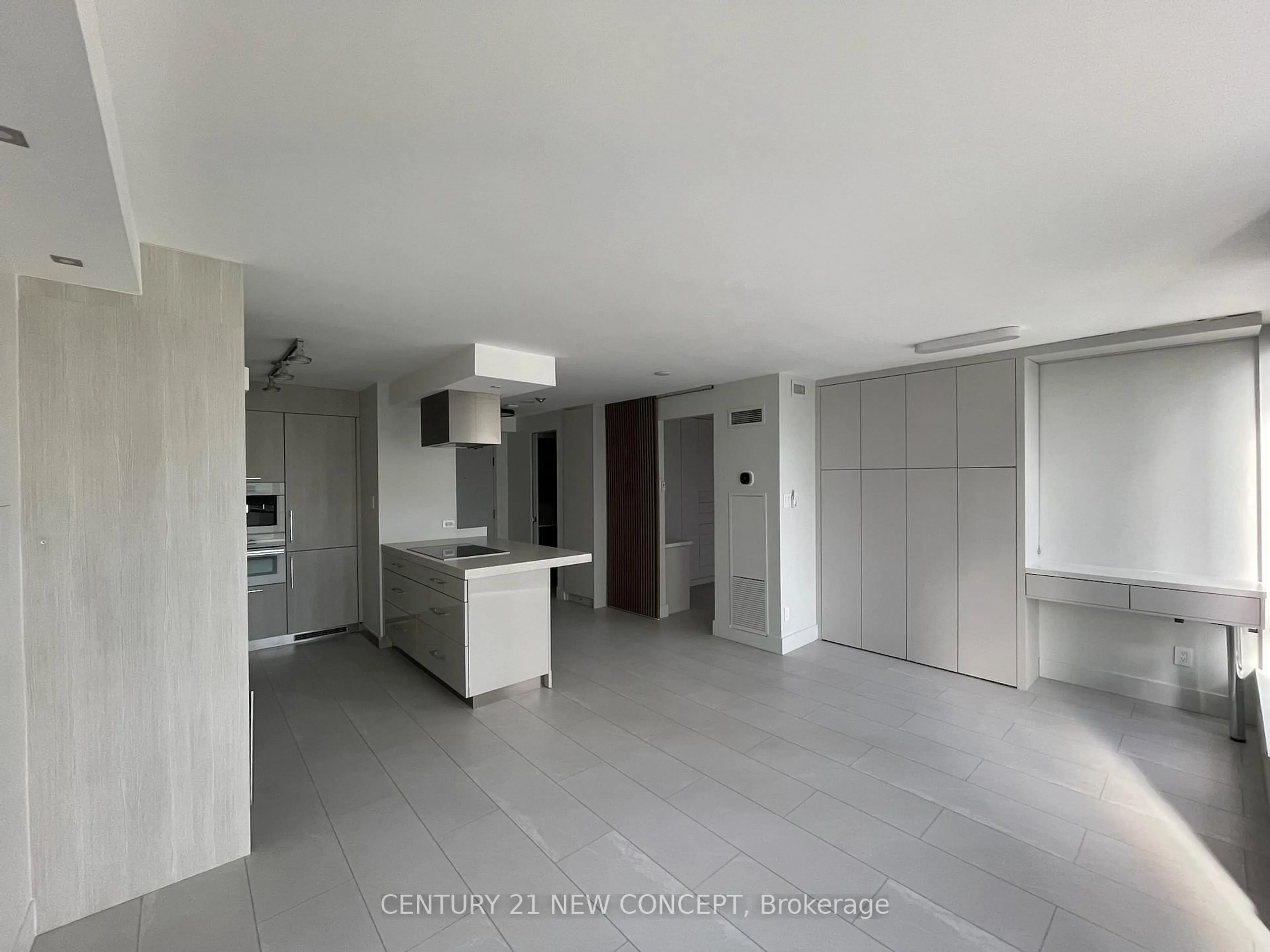 Open concept kitchen, cement floor for 40 Scollard St #1508, Toronto Ontario M5R 3S1