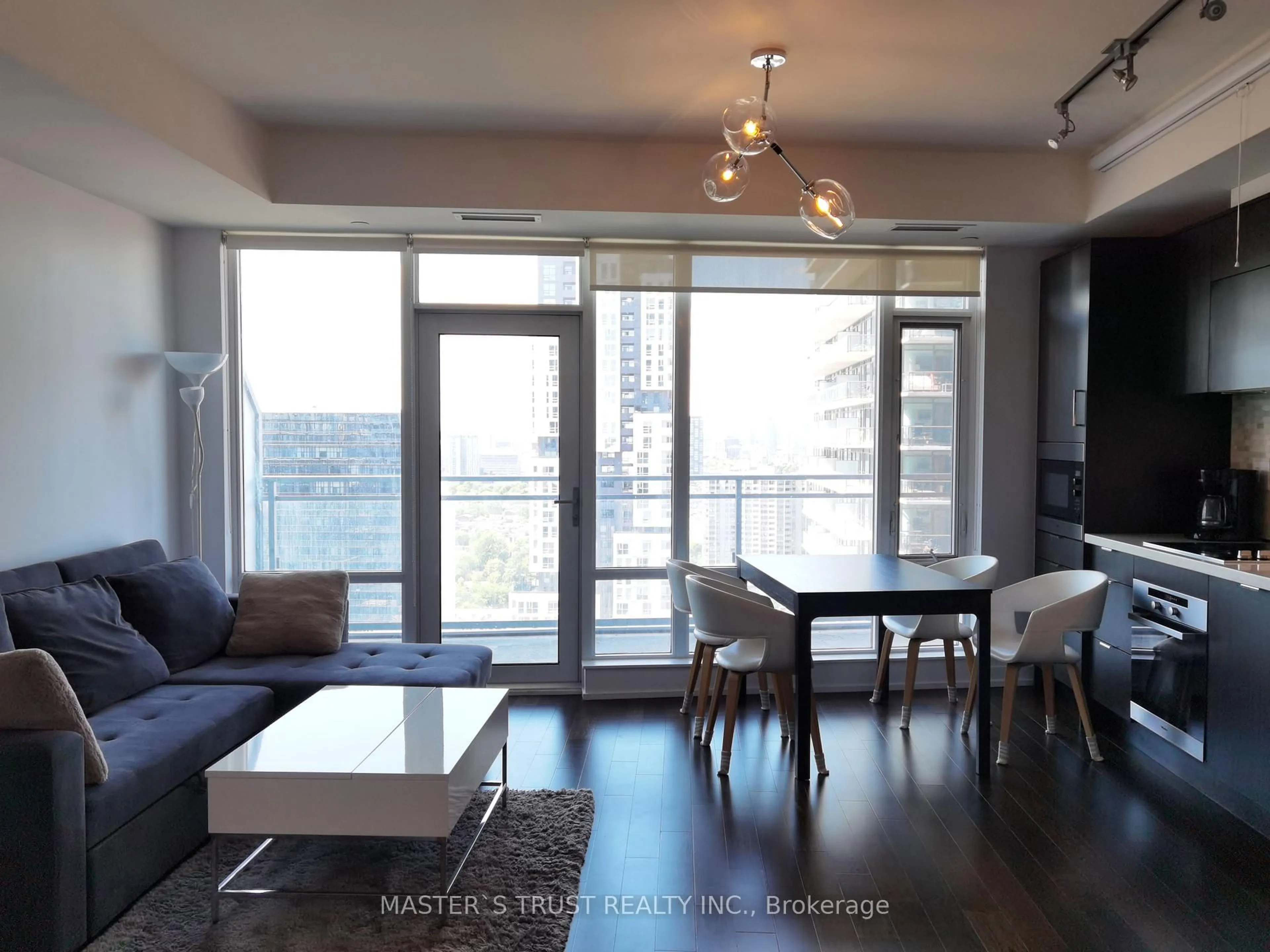 Living room with furniture, wood/laminate floor for 21 Widmer St #2805, Toronto Ontario M5V 0B8