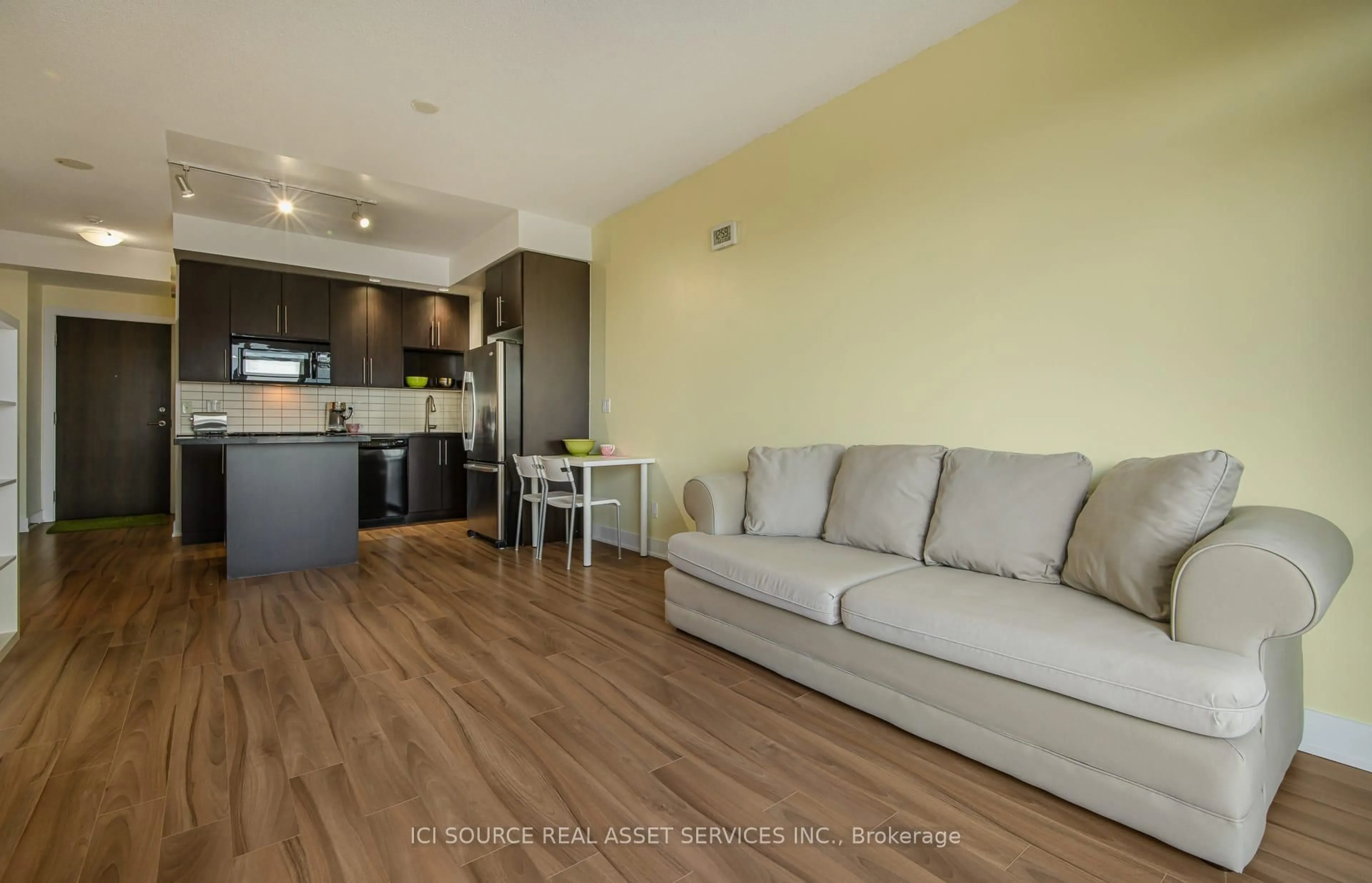 Living room with furniture, wood/laminate floor for 28 Linden St #2303, Toronto Ontario M4Y 0A4