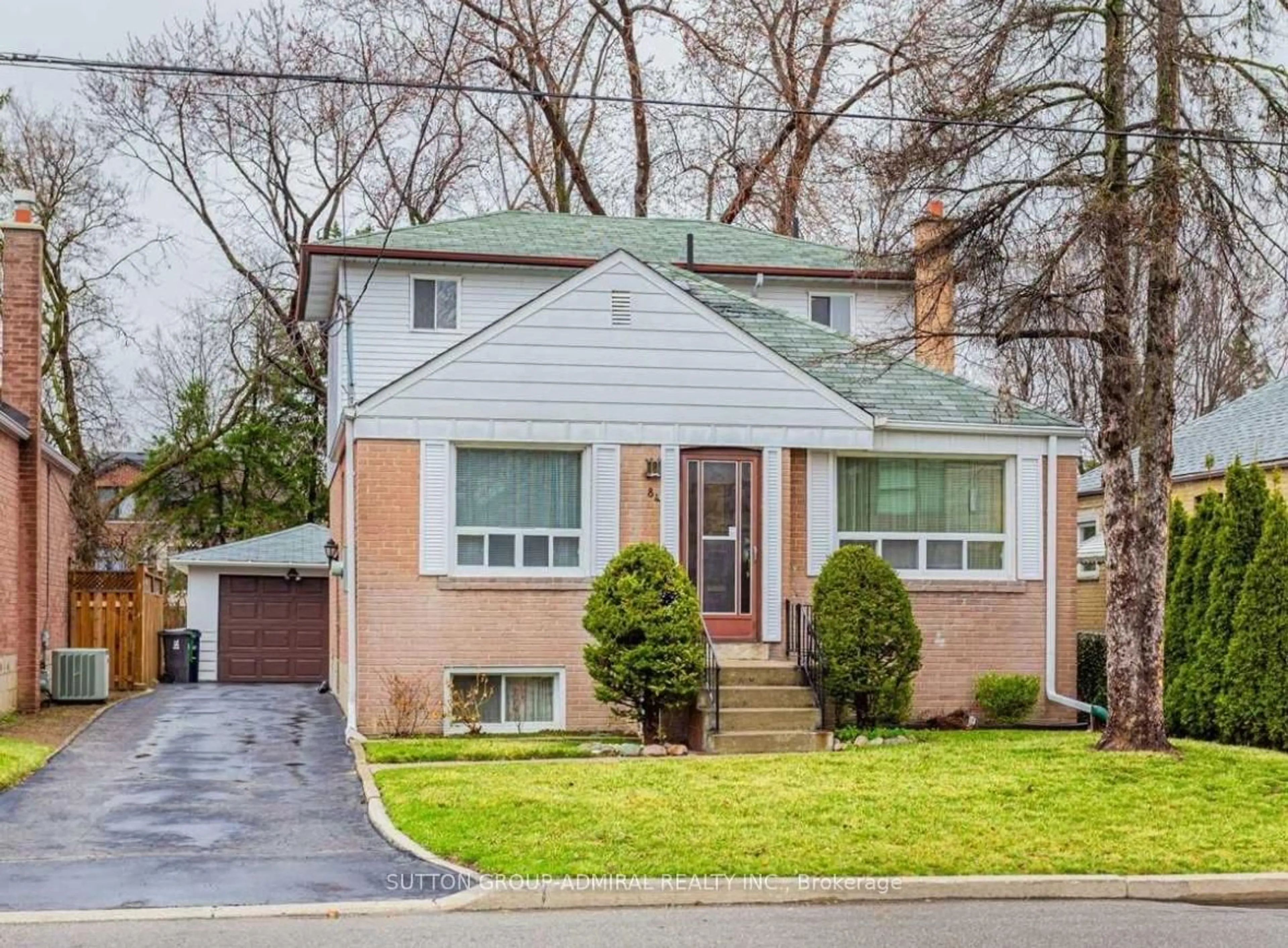 Home with brick exterior material, street for 84 Reiner Rd, Toronto Ontario M3H 2L5
