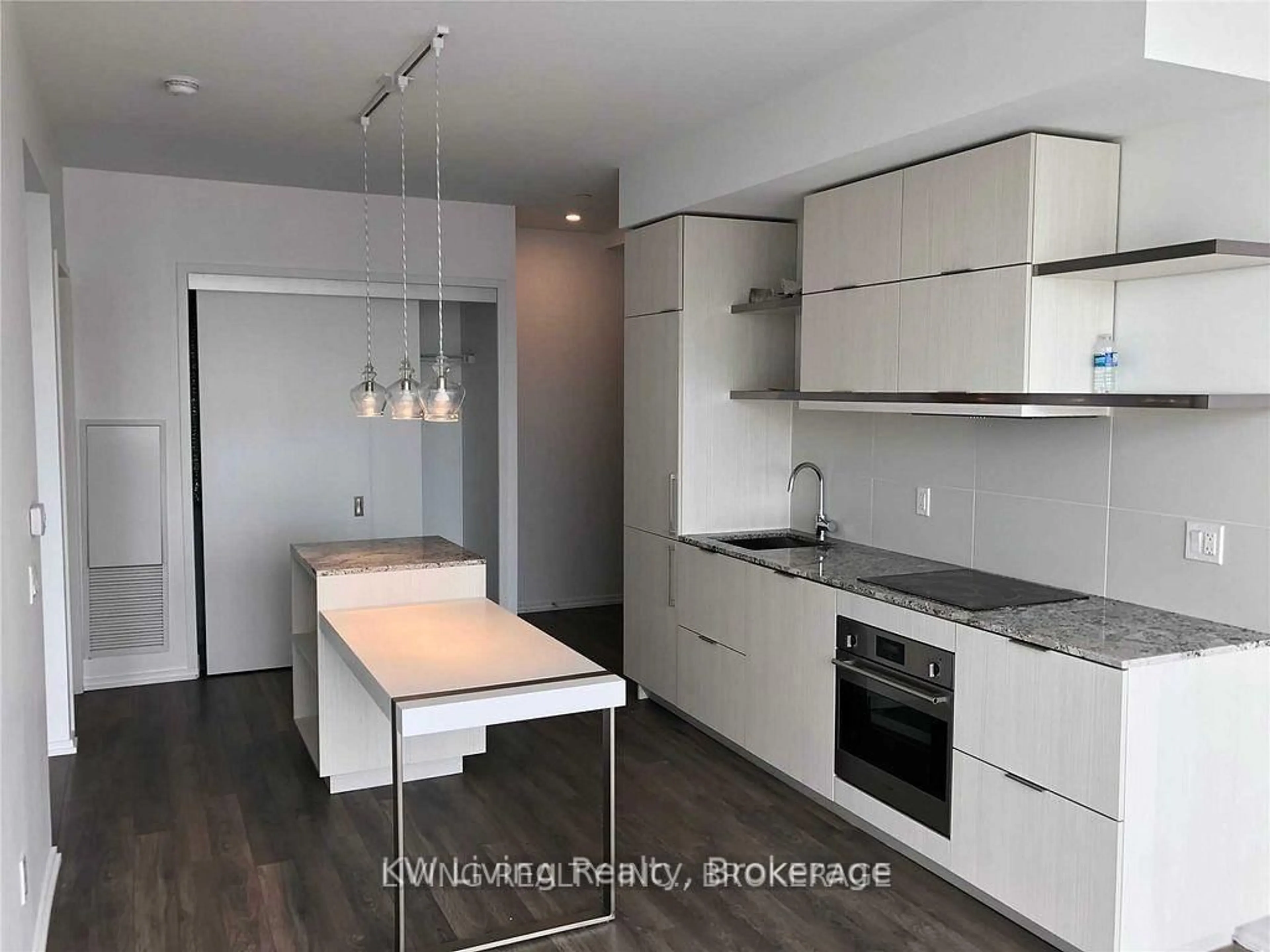 Open concept kitchen, wood/laminate floor for 197 Yonge St #3714, Toronto Ontario M5B 1M4