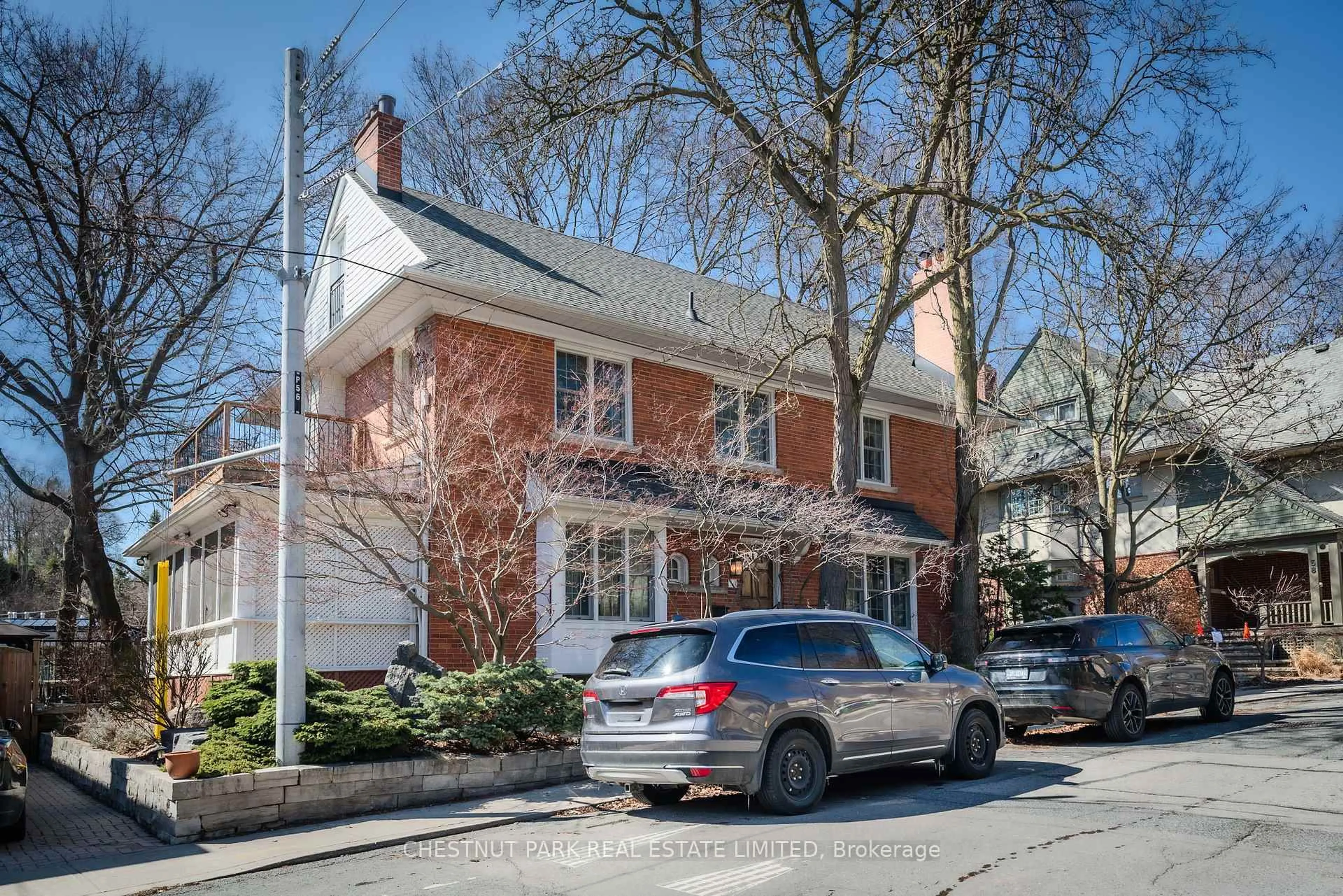 Home with brick exterior material, street for 56 Poplar Plains Rd, Toronto Ontario M4V 2M8