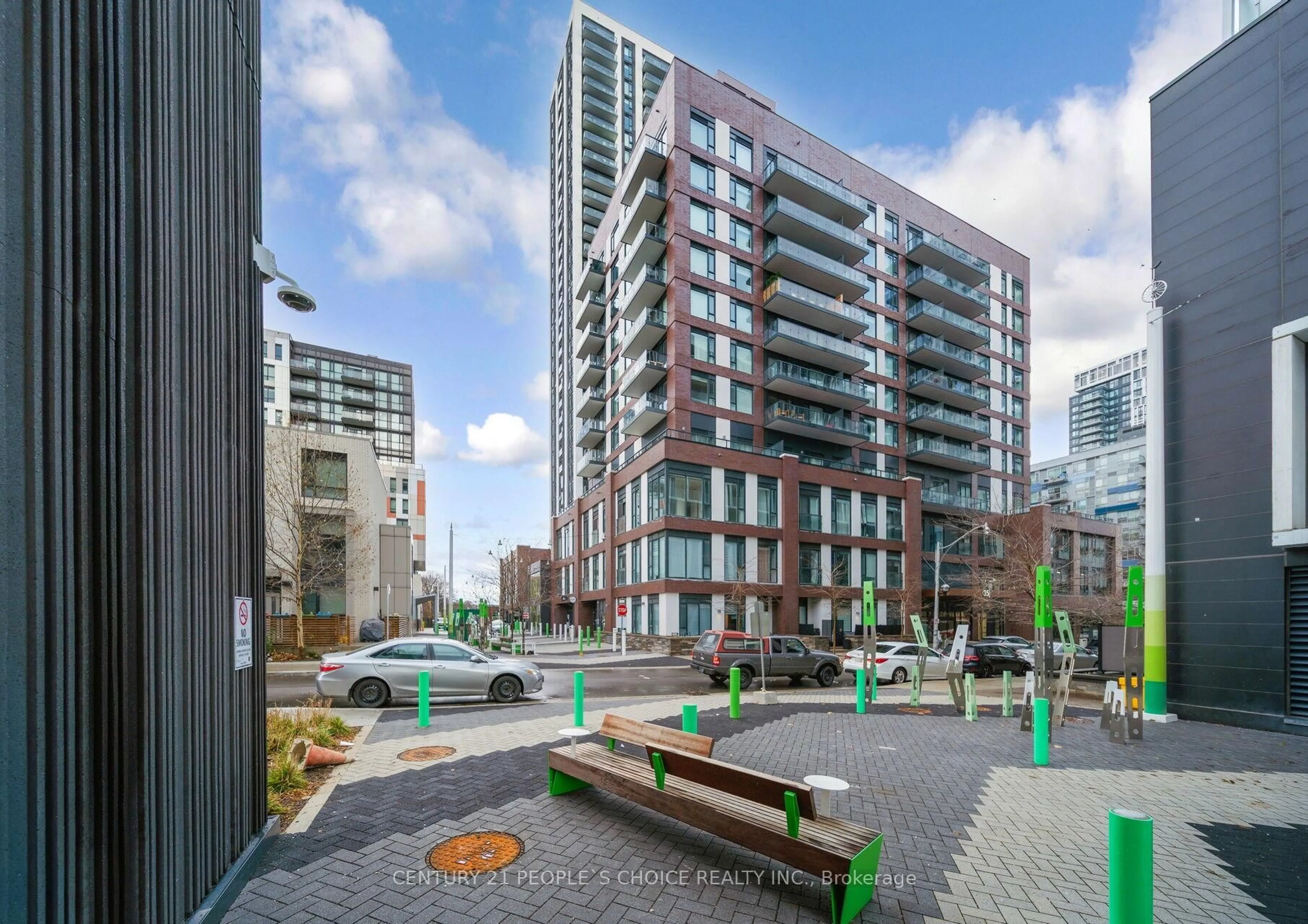 Patio, city buildings view from balcony for 35 Tubman Ave #323, Toronto Ontario M5A 0T1