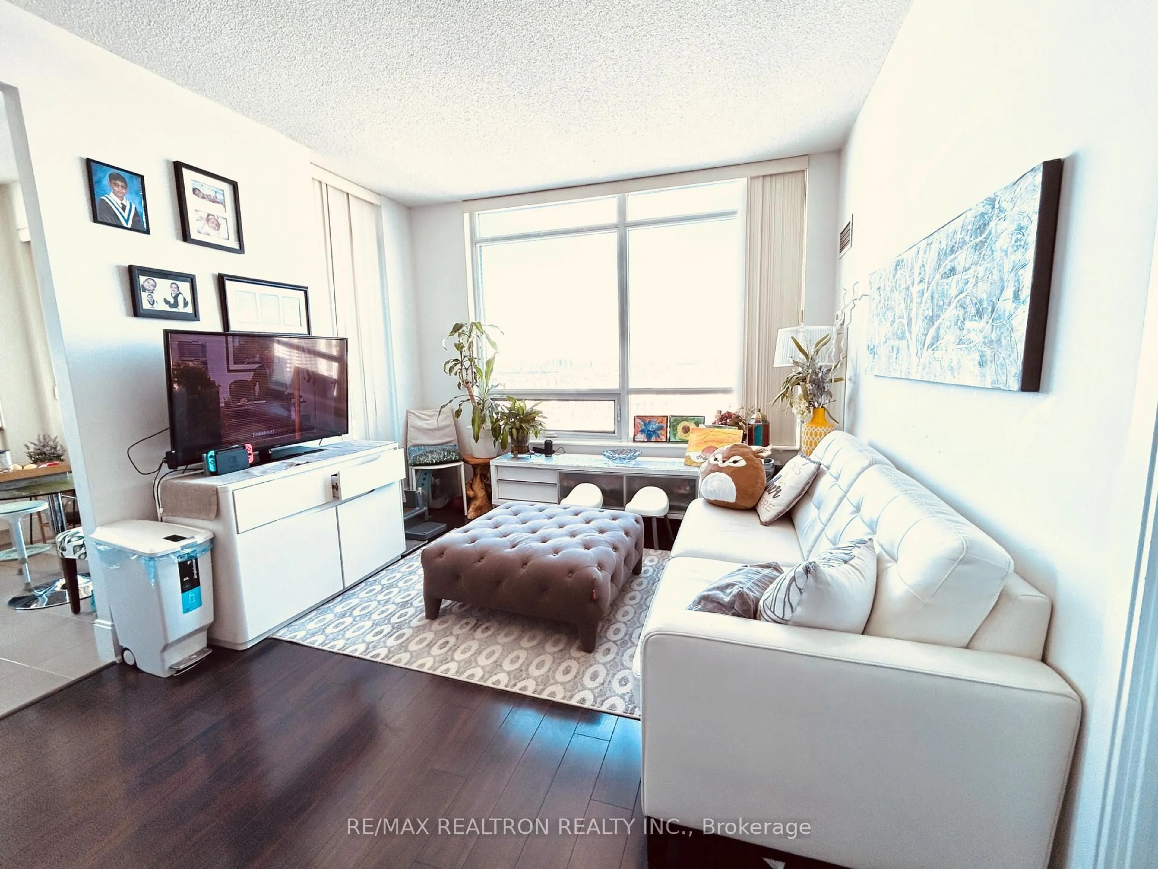 Living room with furniture, unknown for 181 Wynford Dr #2907, Toronto Ontario M3C 0C6