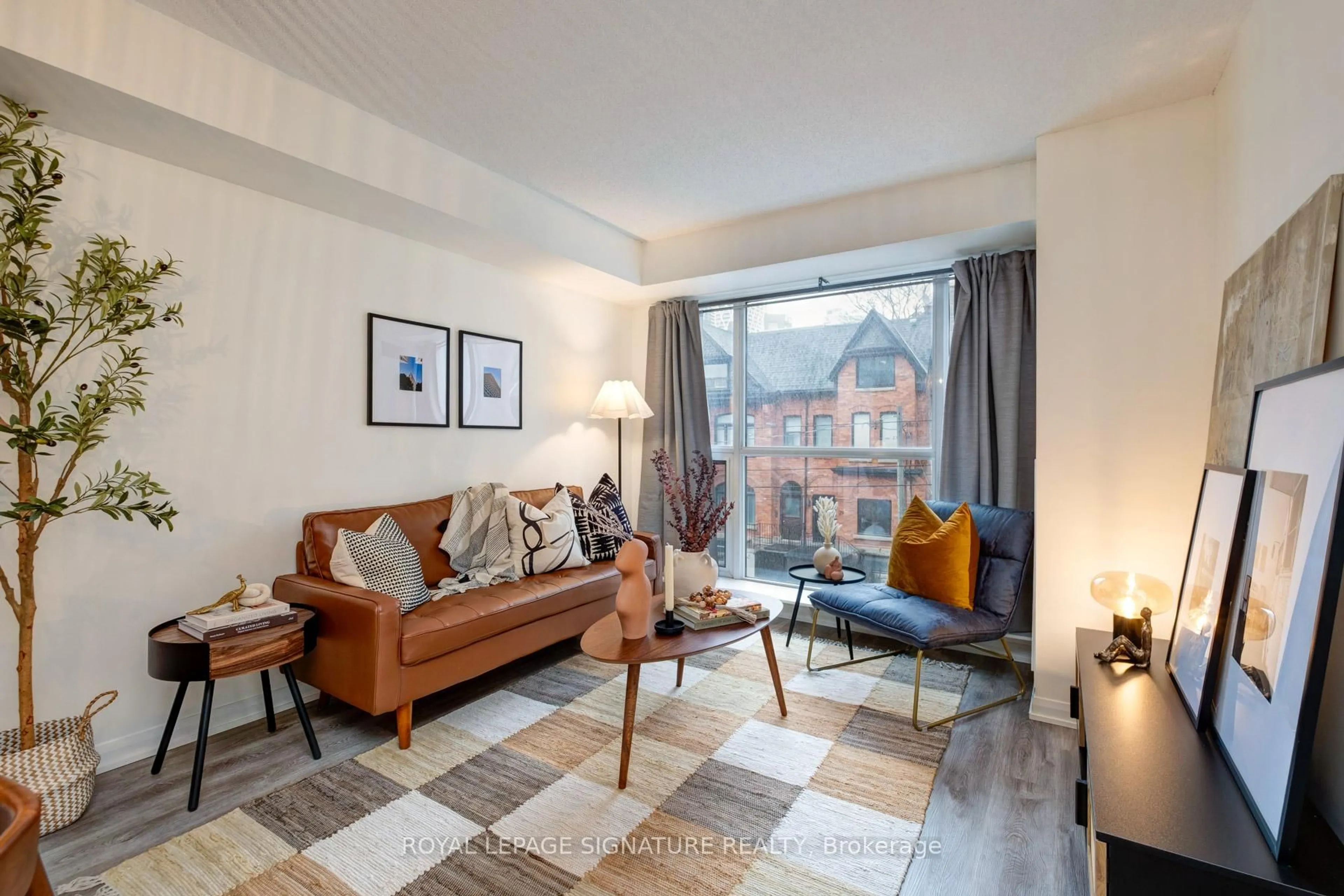 Living room with furniture, unknown for 18 Beverley St #311, Toronto Ontario M5T 3L2