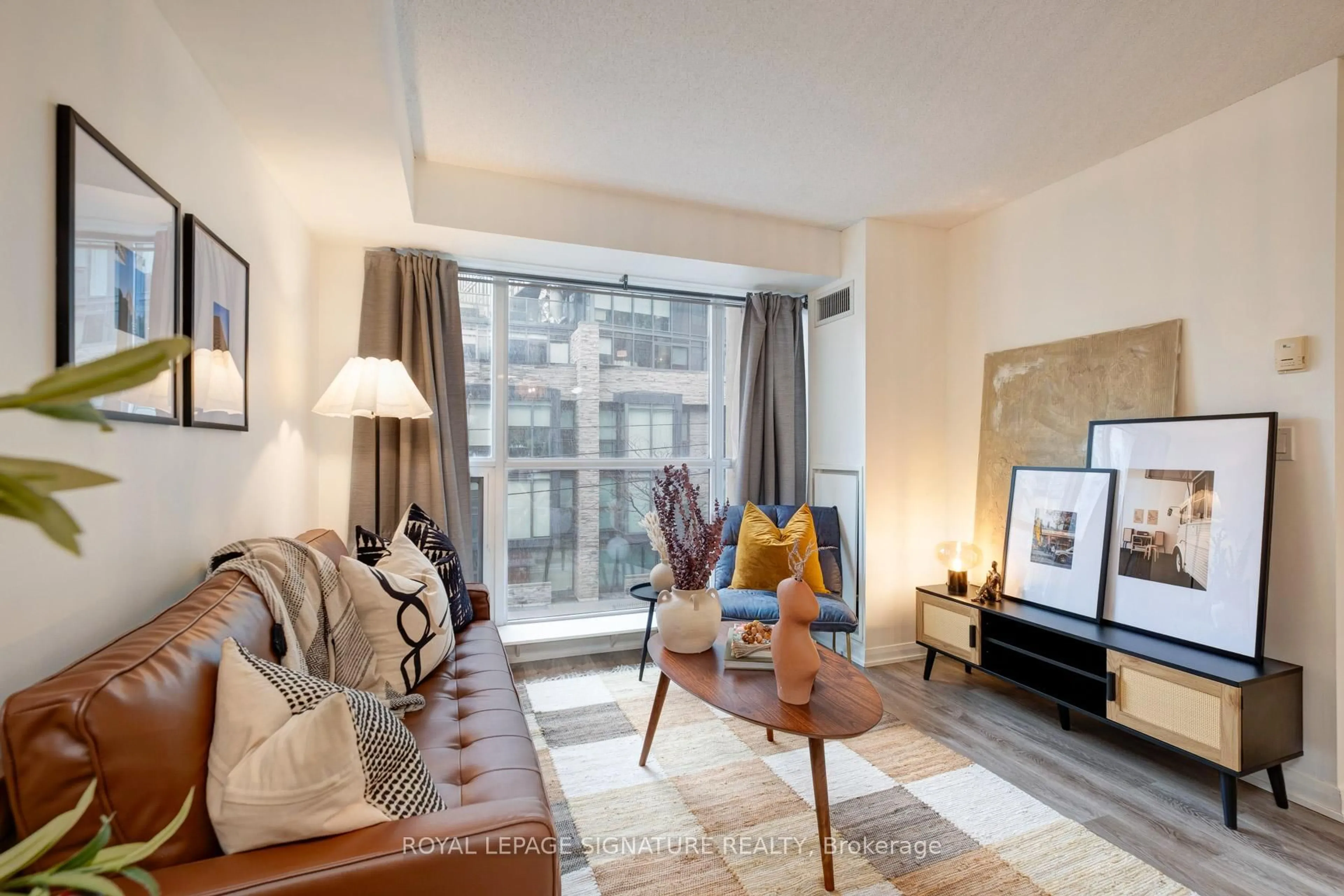 Living room with furniture, unknown for 18 Beverley St #311, Toronto Ontario M5T 3L2