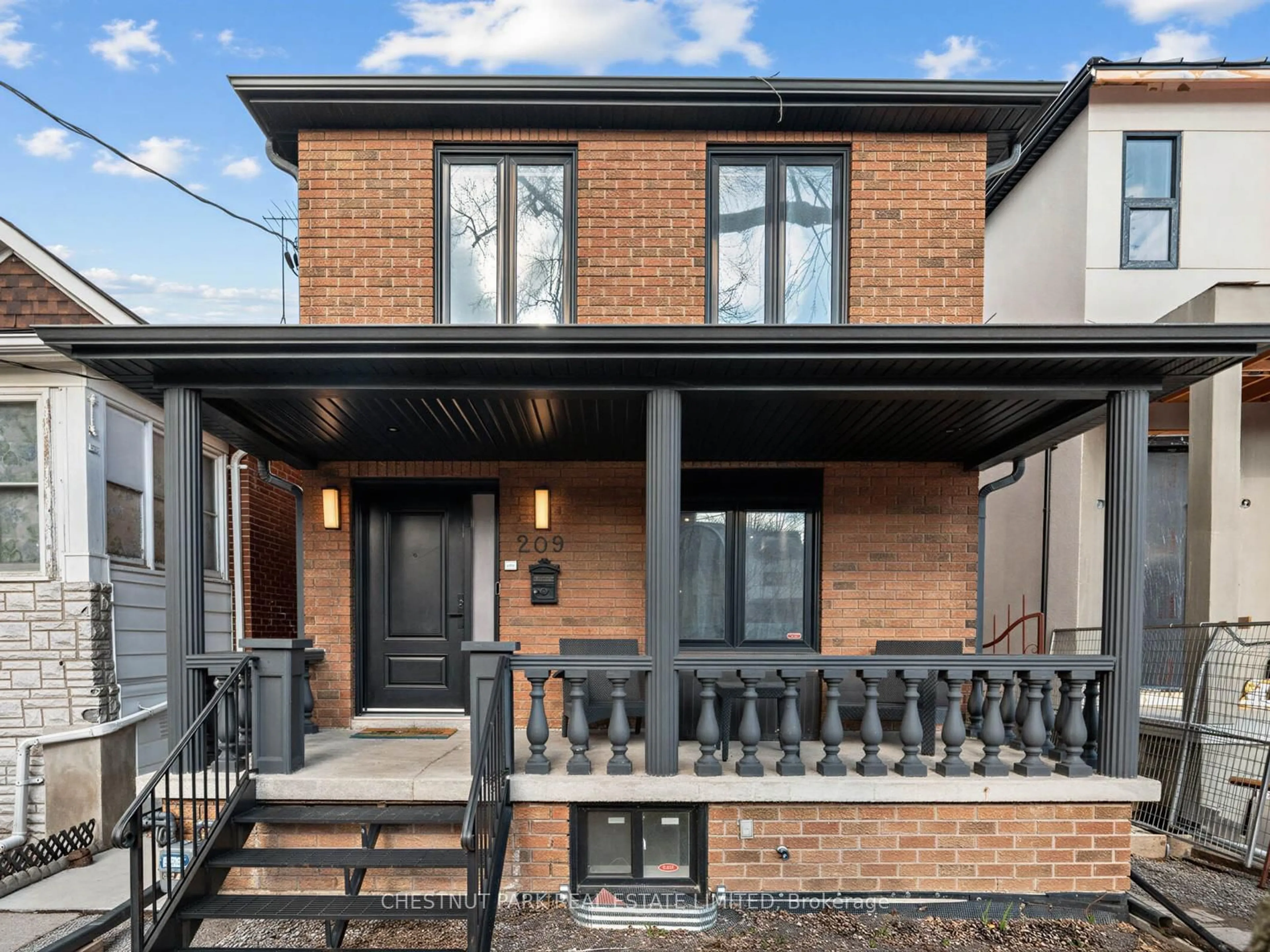 Home with brick exterior material, street for 209 Robina Ave, Toronto Ontario M6C 3Y9