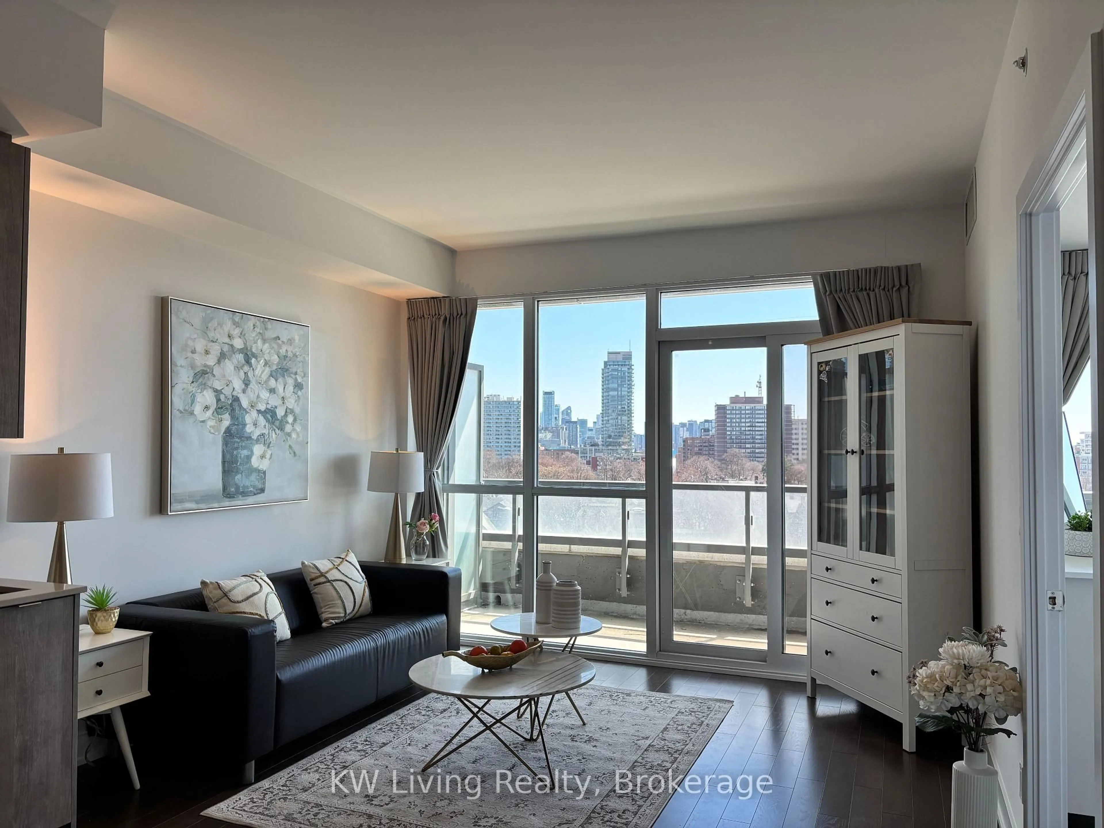 Living room with furniture, wood/laminate floor for 181 Bedford Rd #708, Toronto Ontario M5R 0C2