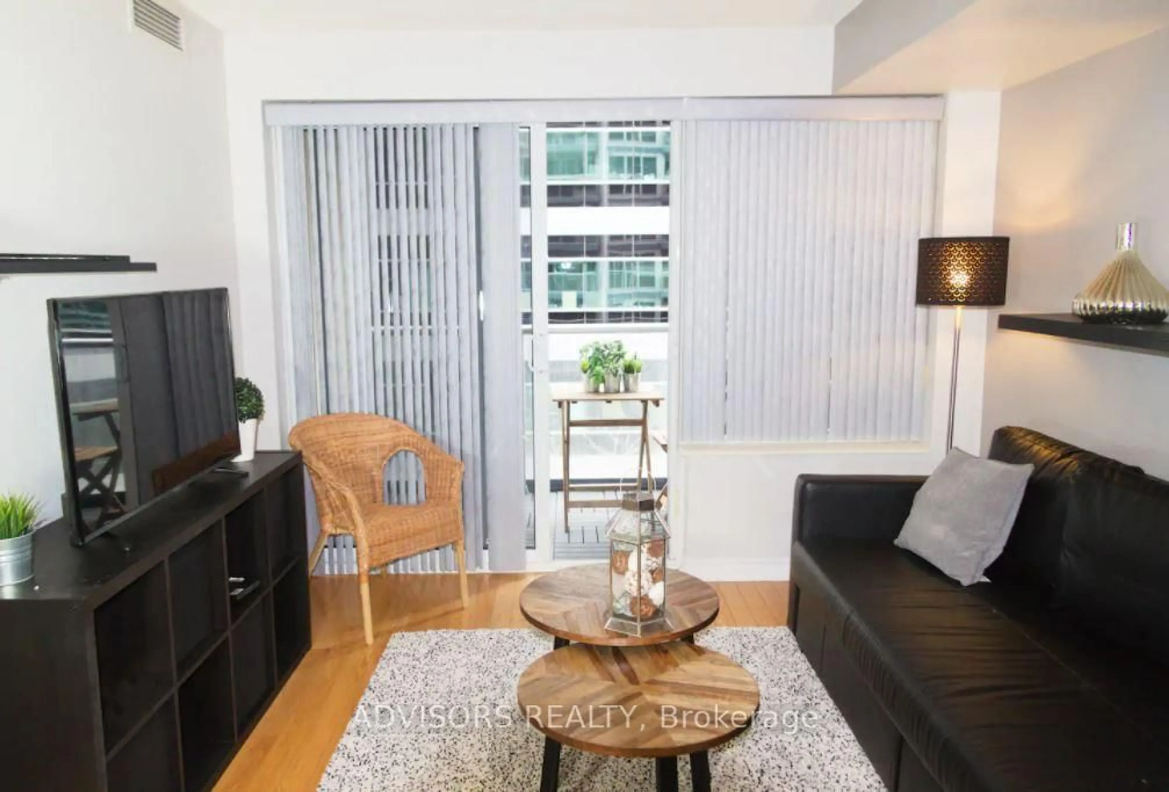 Living room with furniture, wood/laminate floor for 270 Wellington St #413, Toronto Ontario M5V 3P5