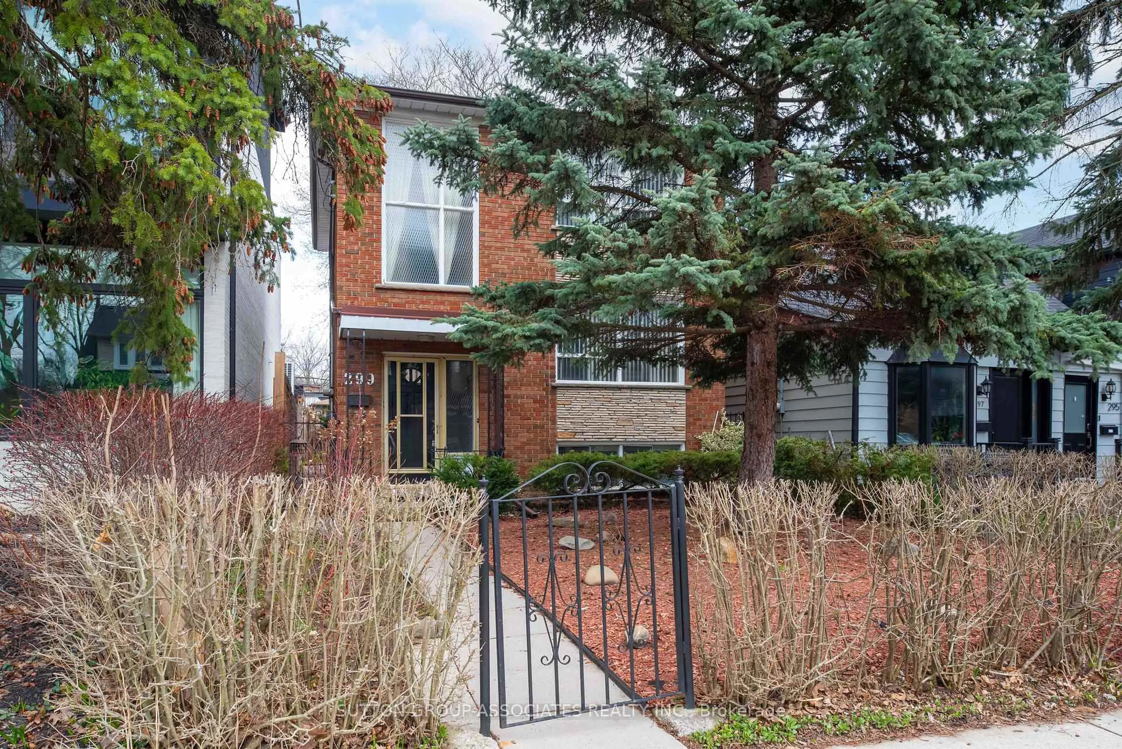 Home with brick exterior material, street for 299 Wychwood Ave, Toronto Ontario M6C 2T6