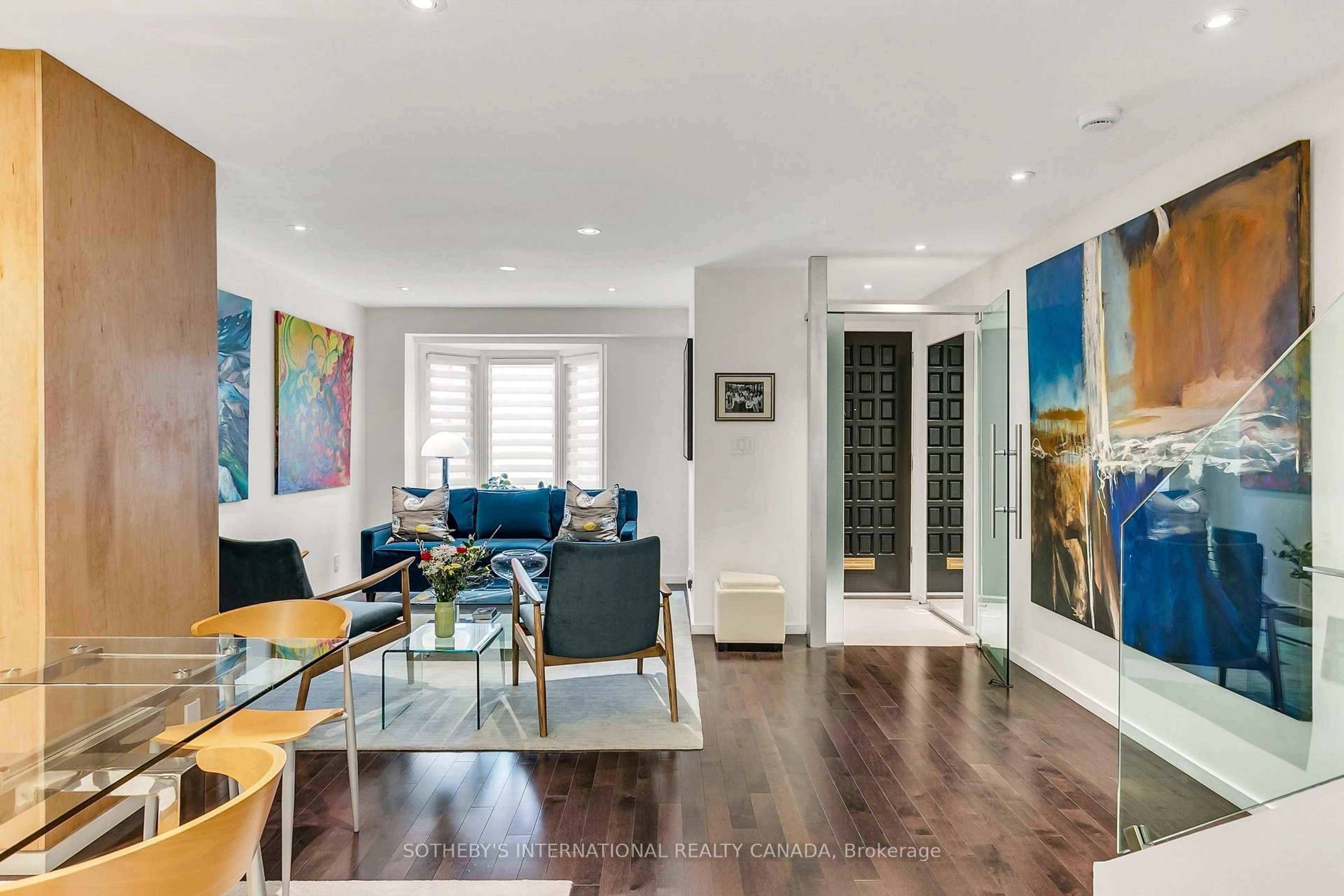 Living room with furniture, wood/laminate floor for 30 Sword St, Toronto Ontario M5A 3N2