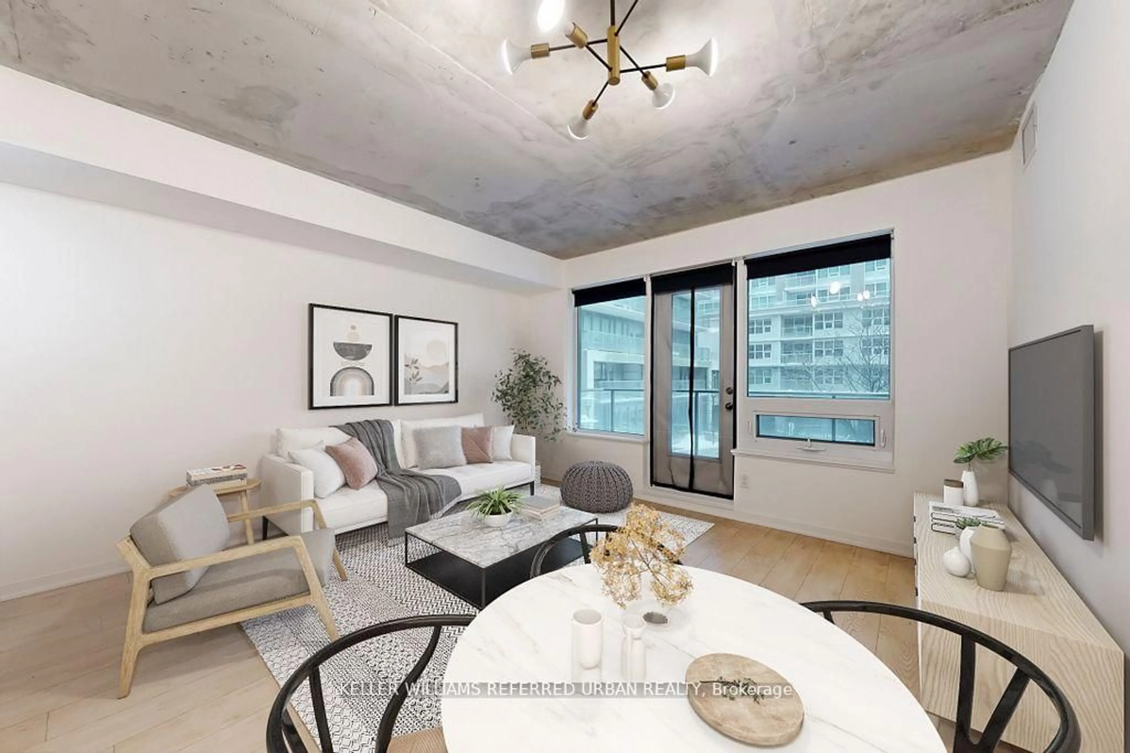 Living room with furniture, cement floor for 55 East Liberty St #201, Toronto Ontario M6K 3P9