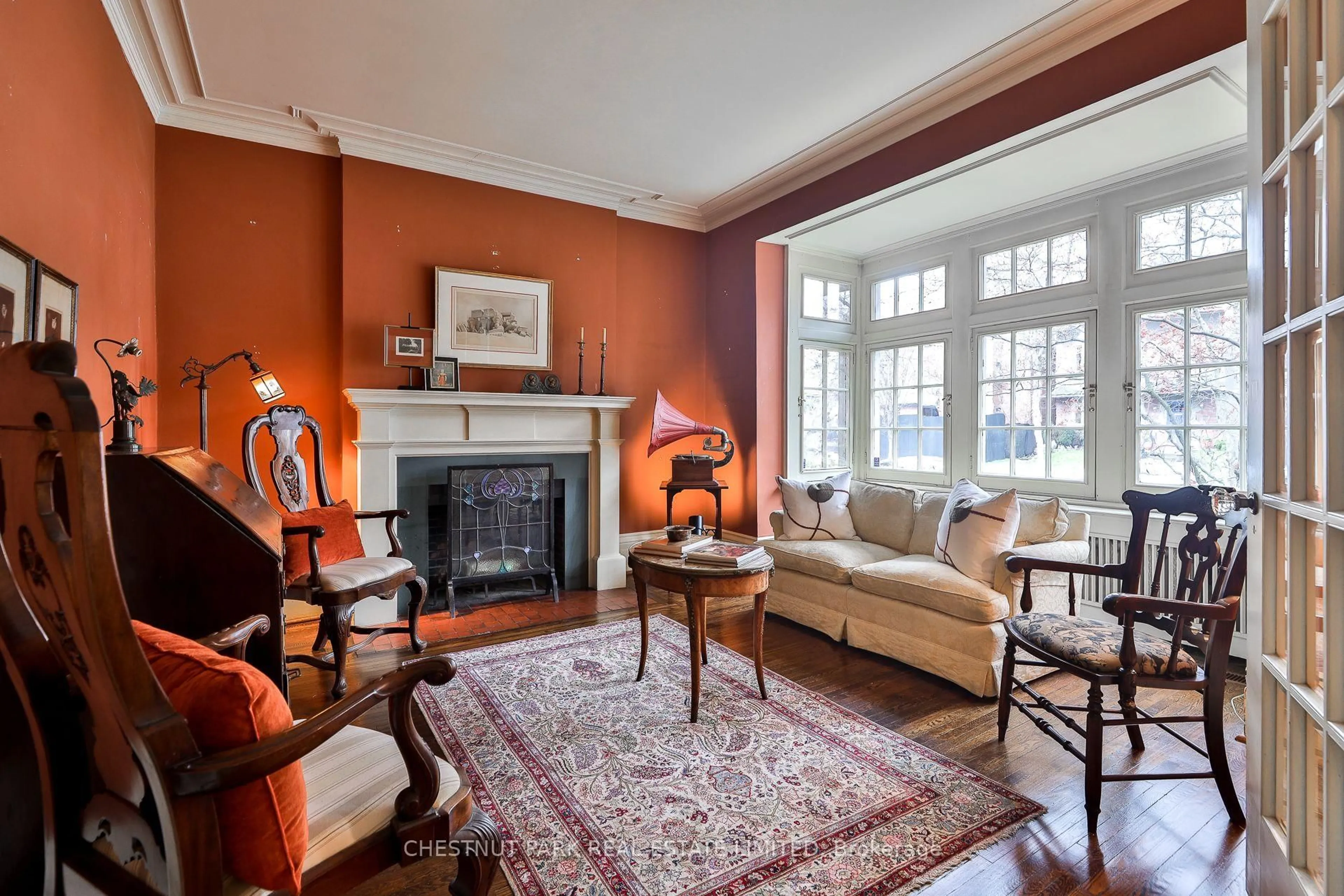 Living room with furniture, carpet floor for 127 Roxborough Dr, Toronto Ontario M4W 1X5