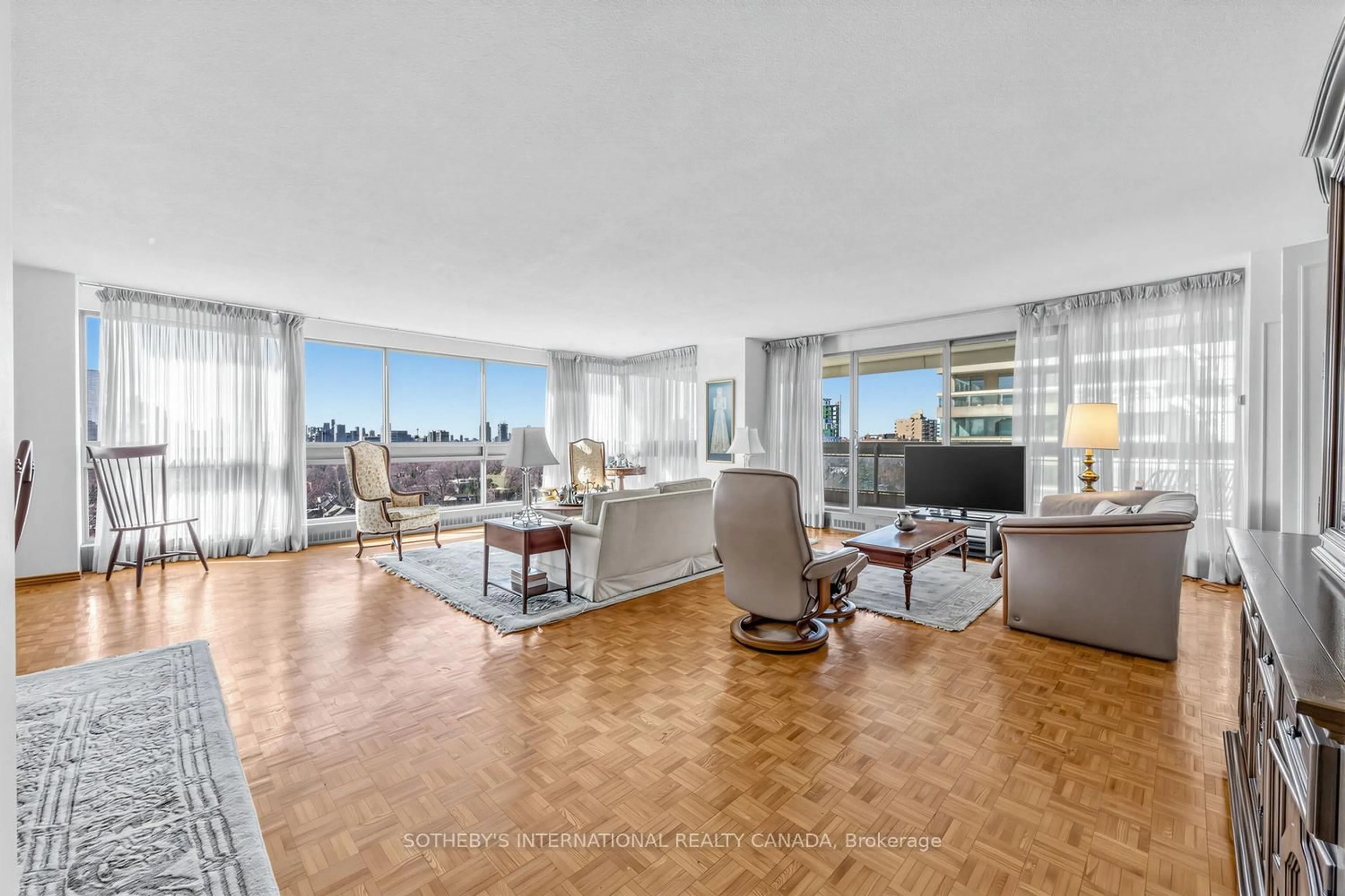 Living room with furniture, floor is not visible for 61 St Clair Ave #1002, Toronto Ontario M4V 2Y8