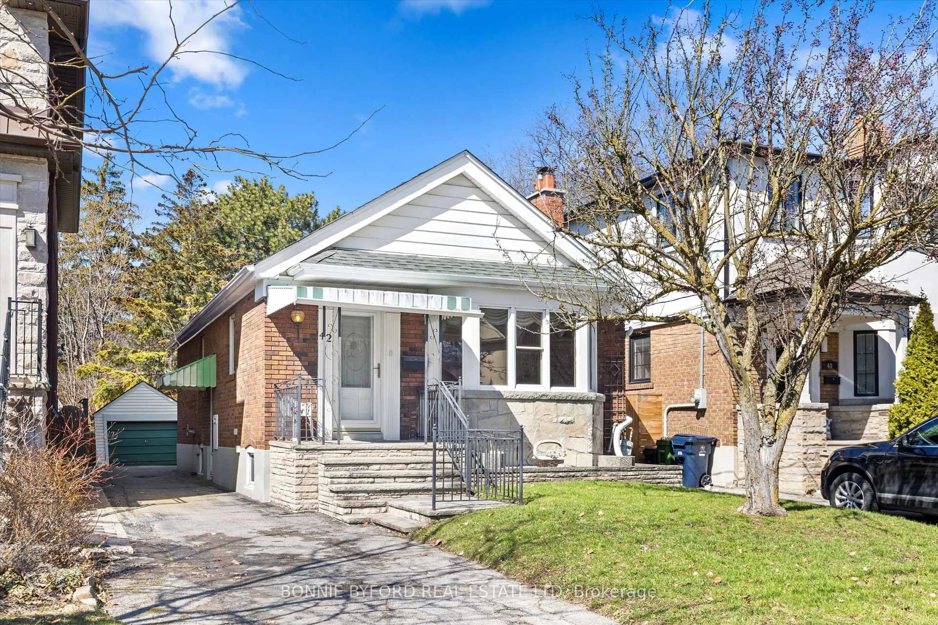 Home with brick exterior material, street for 42 Parklea Dr, Toronto Ontario M4G 2J6