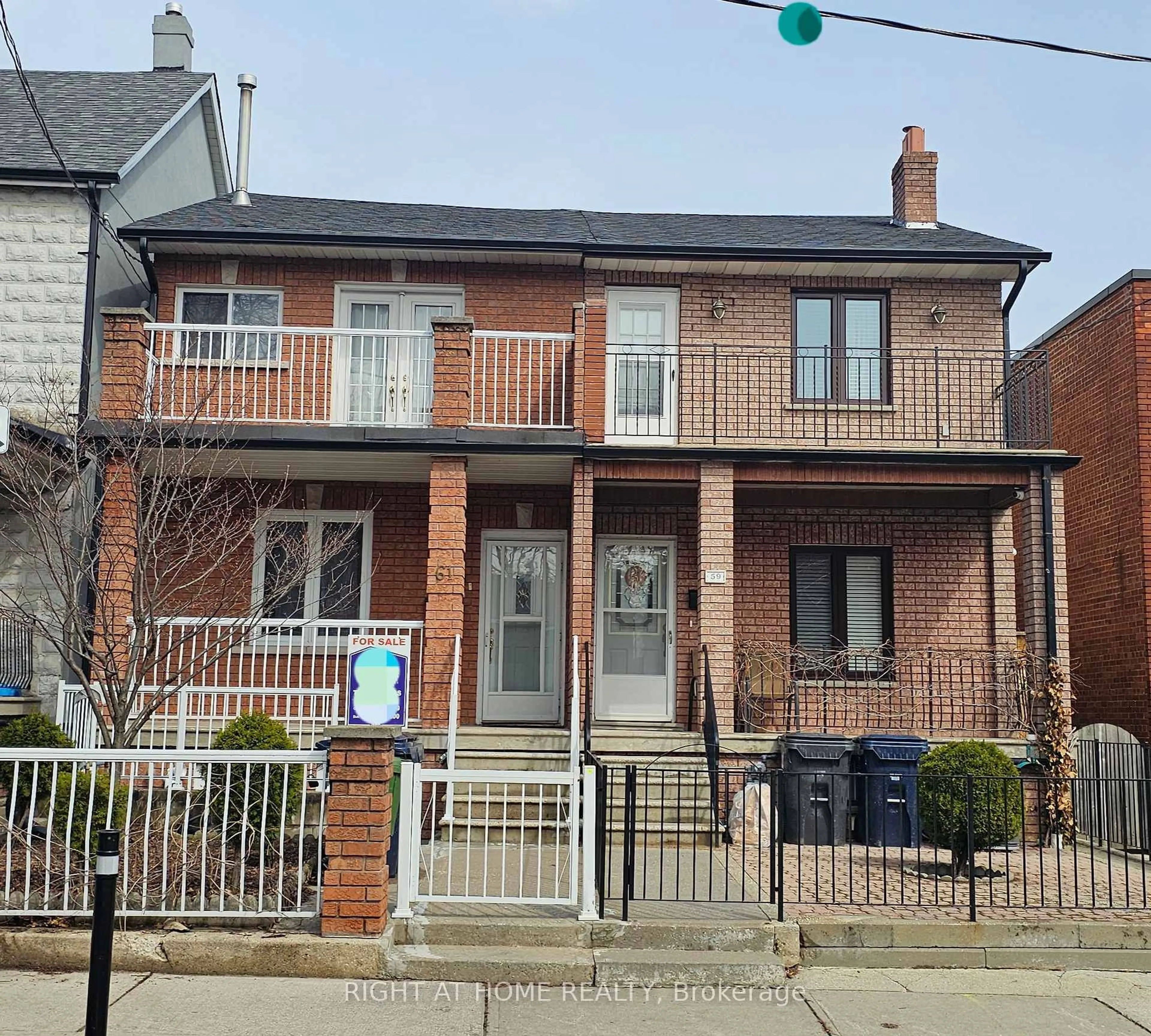Home with brick exterior material, street for 61 Margueretta St, Toronto Ontario M6H 3S4